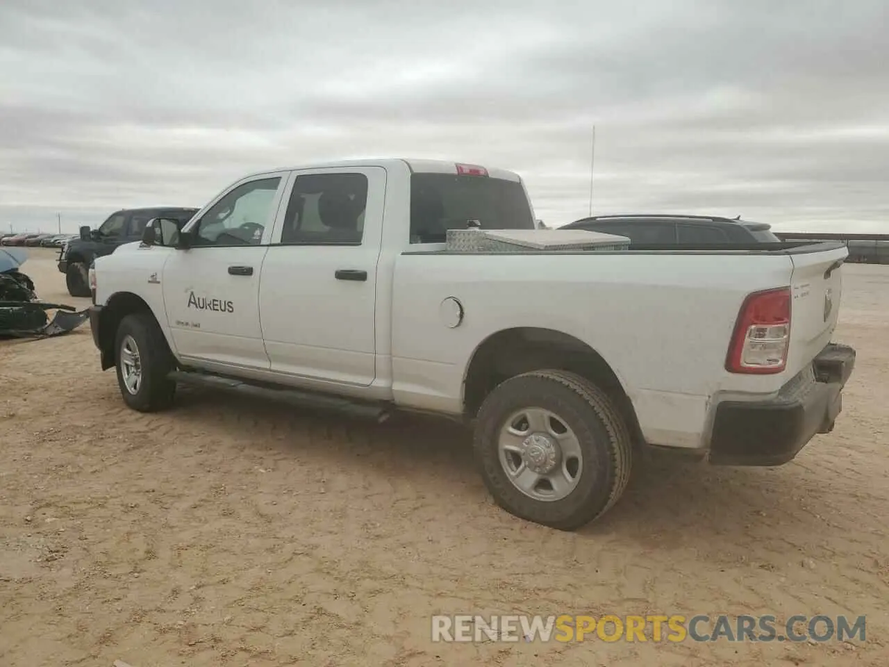 2 Photograph of a damaged car 3C6UR5CL6NG213524 RAM 2500 2022