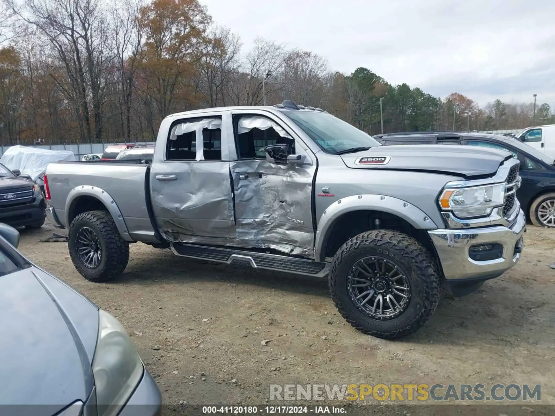 13 Photograph of a damaged car 3C6UR5CL7NG222524 RAM 2500 2022