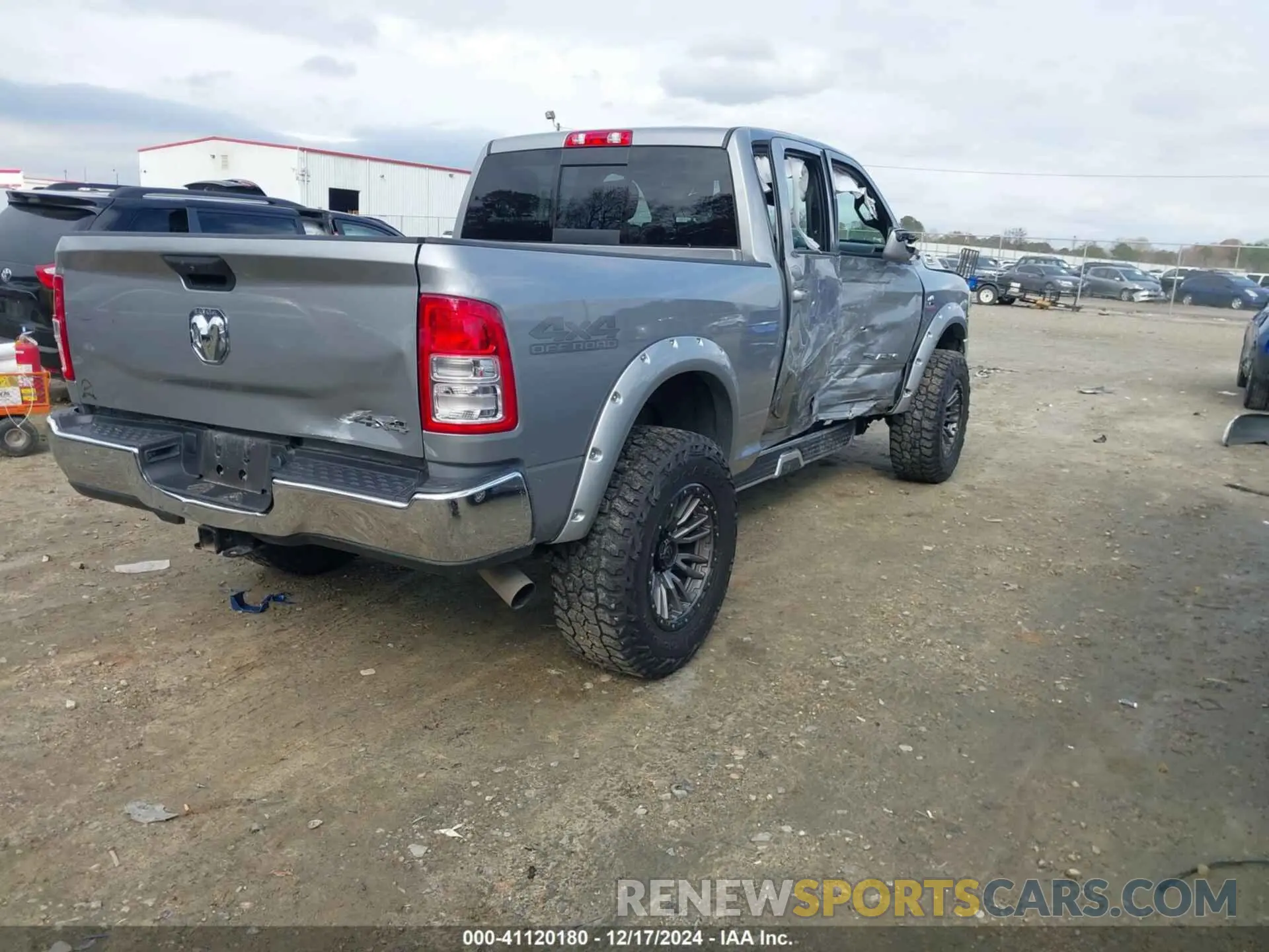 4 Photograph of a damaged car 3C6UR5CL7NG222524 RAM 2500 2022