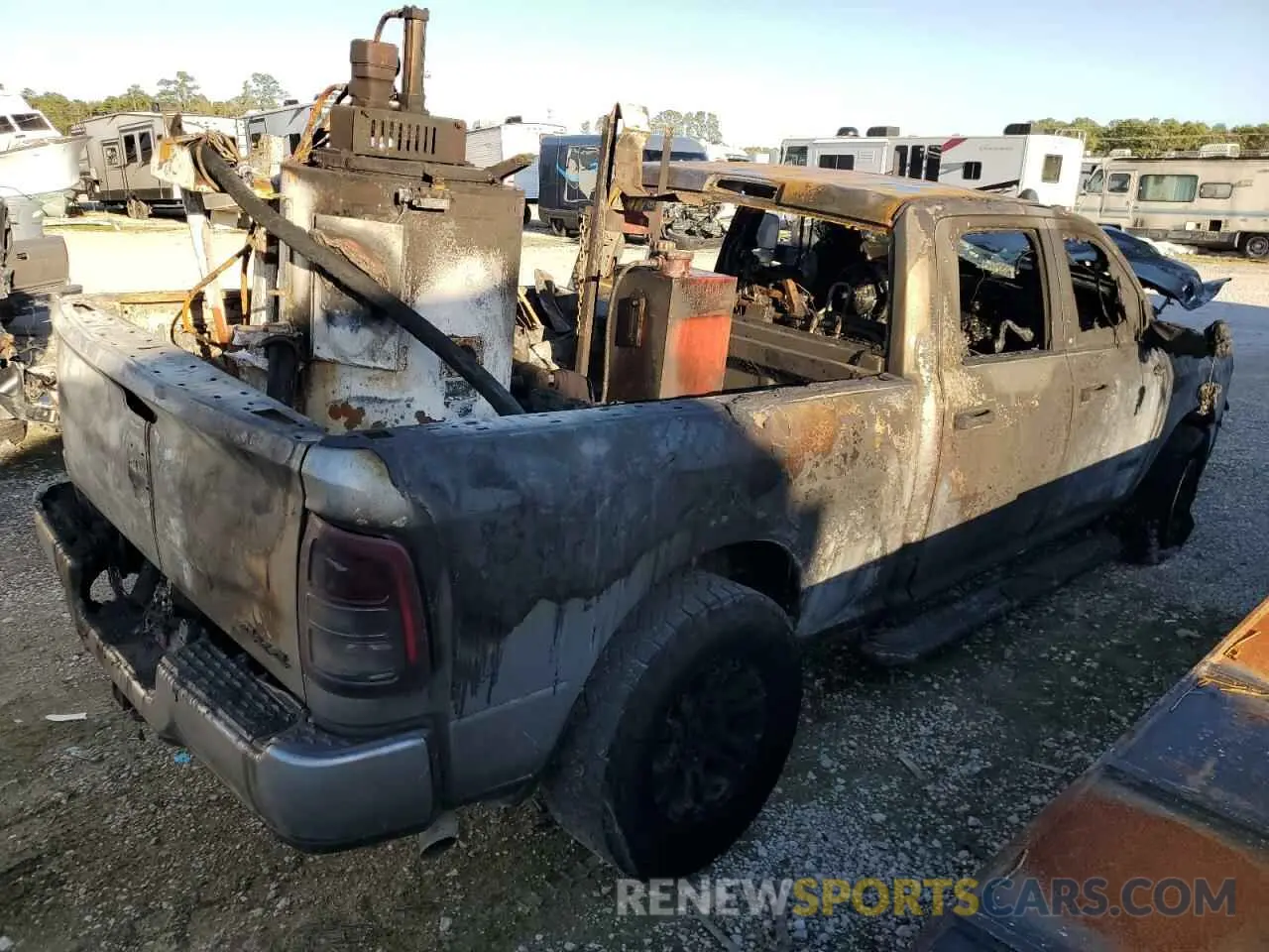 3 Photograph of a damaged car 3C6UR5DJ0NG397629 RAM 2500 2022