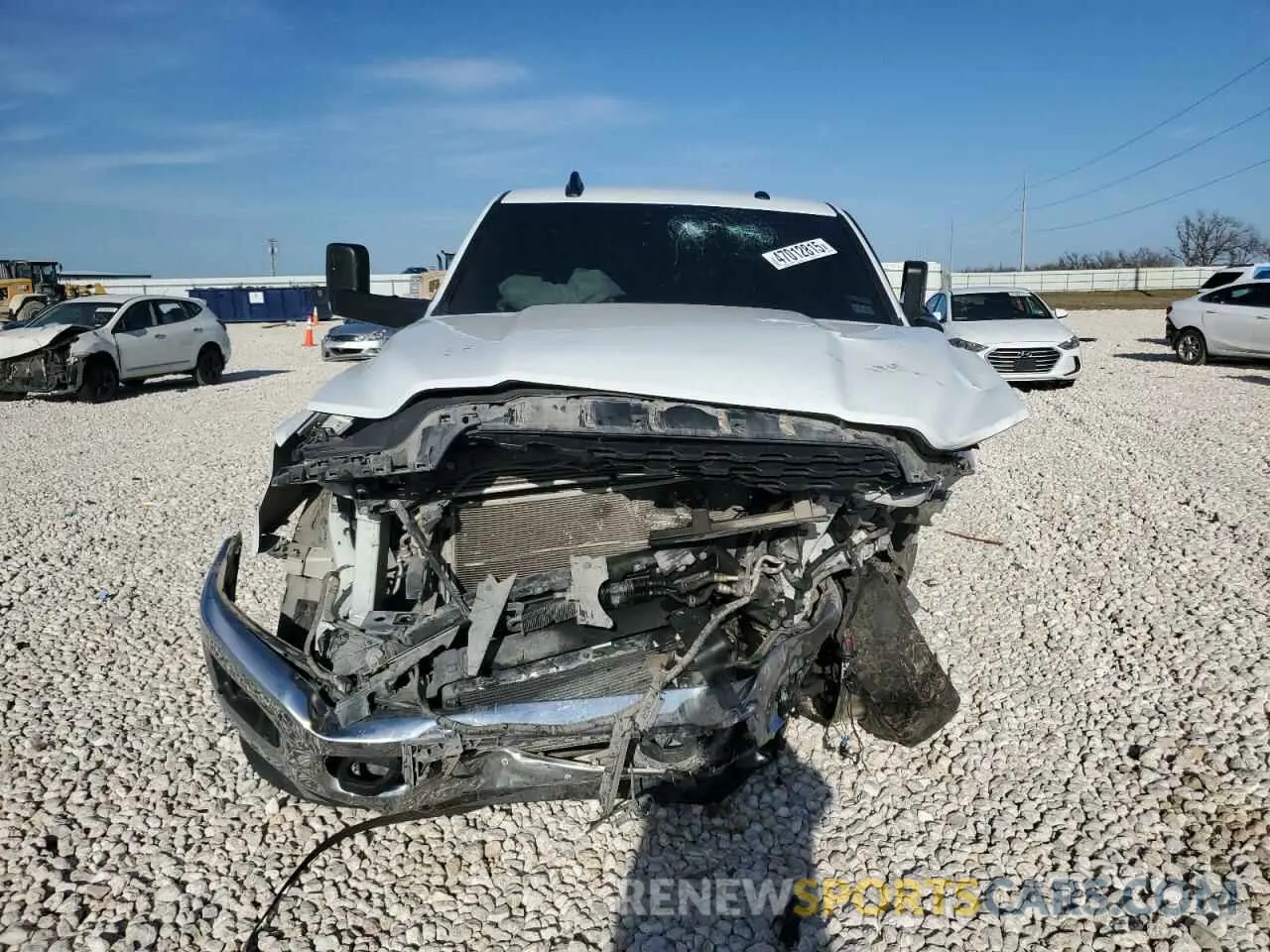 5 Photograph of a damaged car 3C6UR5DL0NG298052 RAM 2500 2022