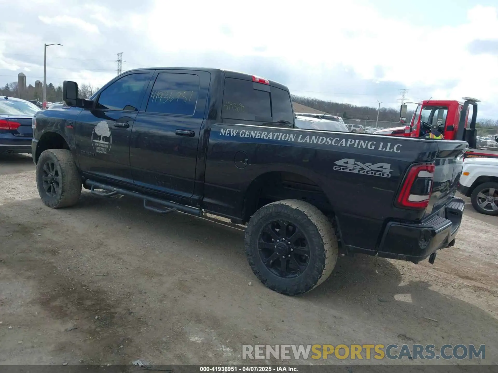 3 Photograph of a damaged car 3C6UR5DL1NG166403 RAM 2500 2022