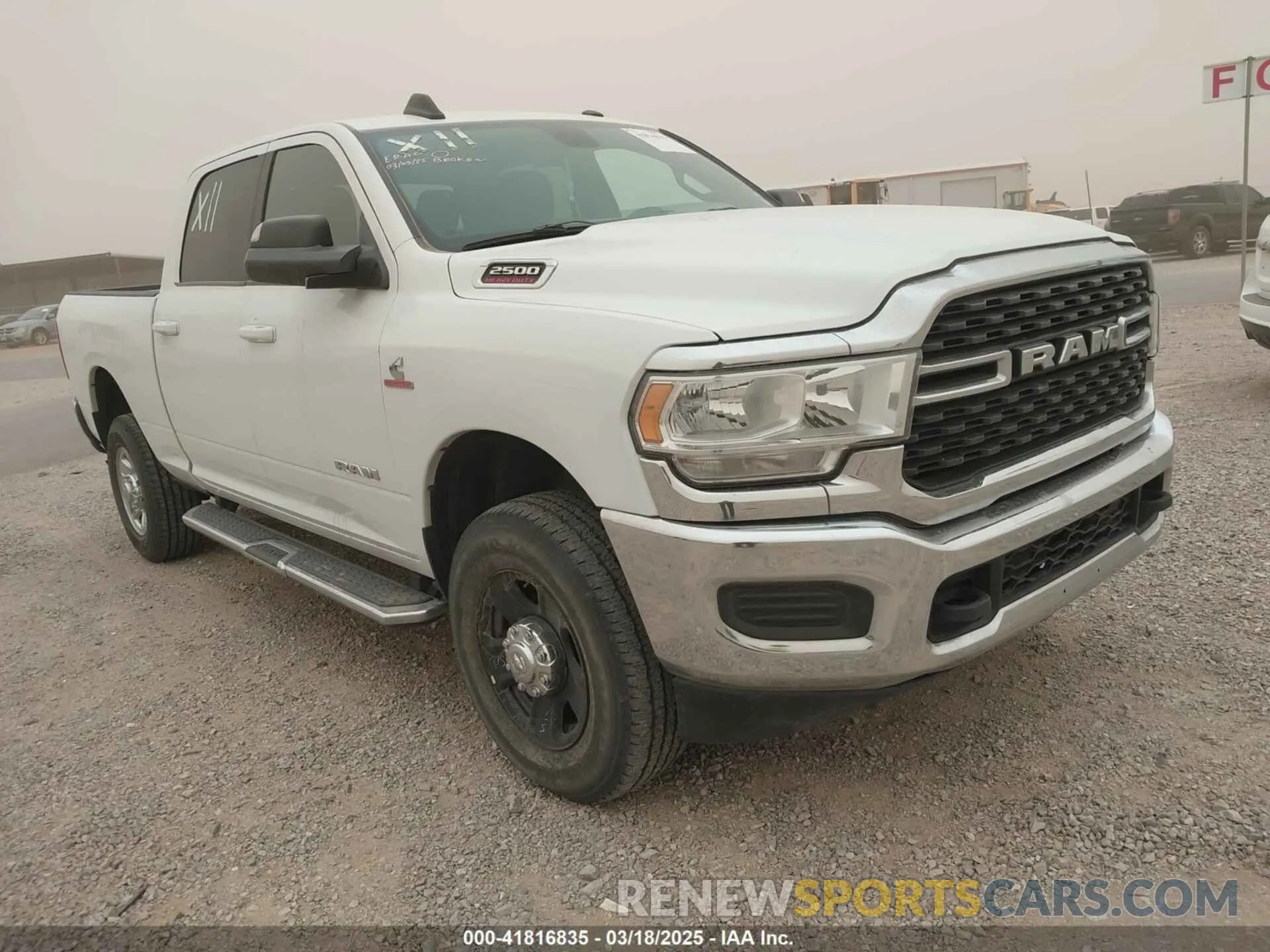 1 Photograph of a damaged car 3C6UR5DL1NG235817 RAM 2500 2022