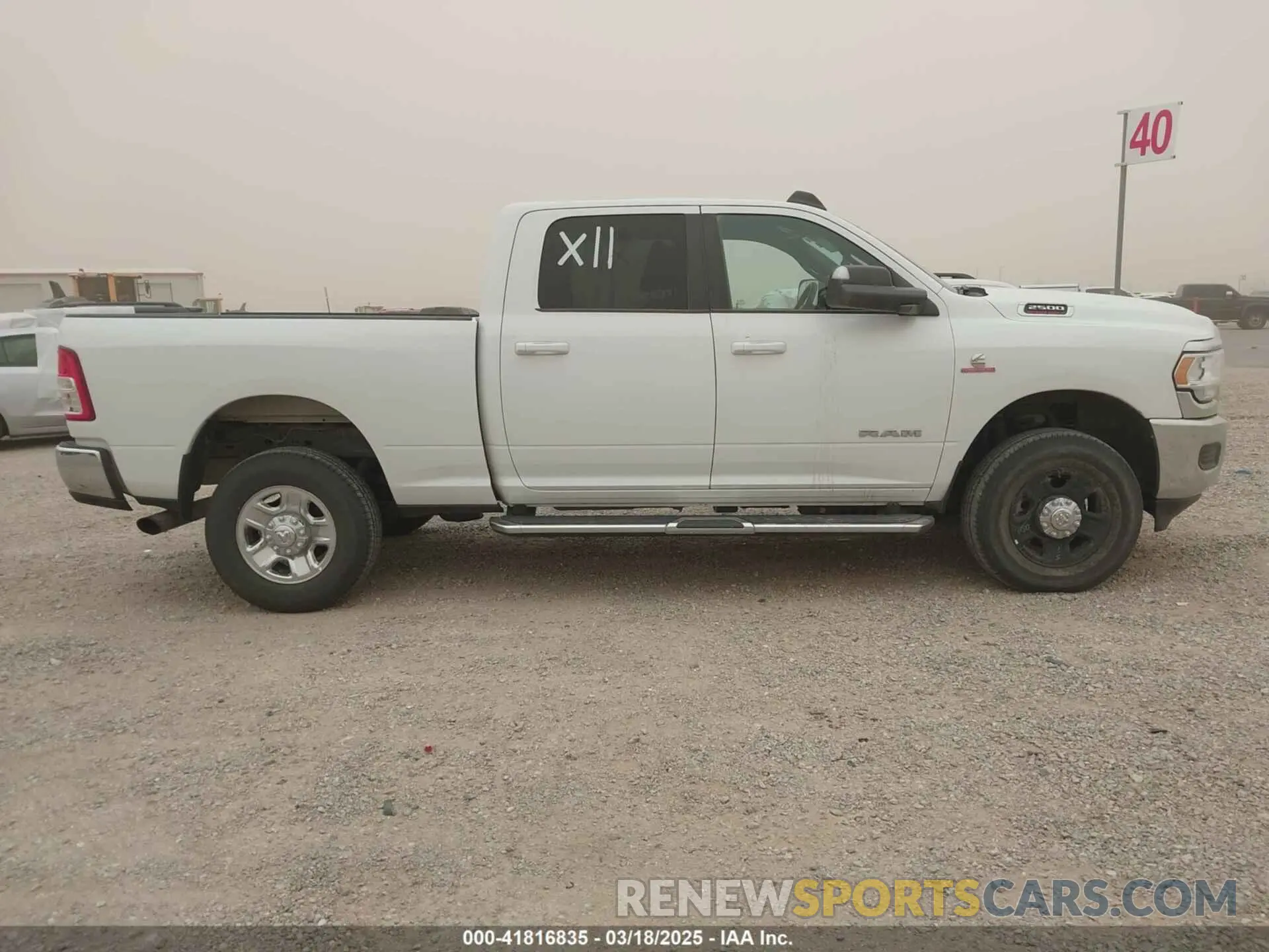 13 Photograph of a damaged car 3C6UR5DL1NG235817 RAM 2500 2022