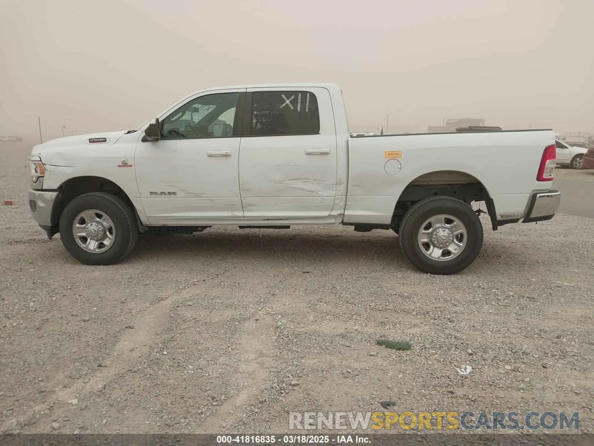 14 Photograph of a damaged car 3C6UR5DL1NG235817 RAM 2500 2022