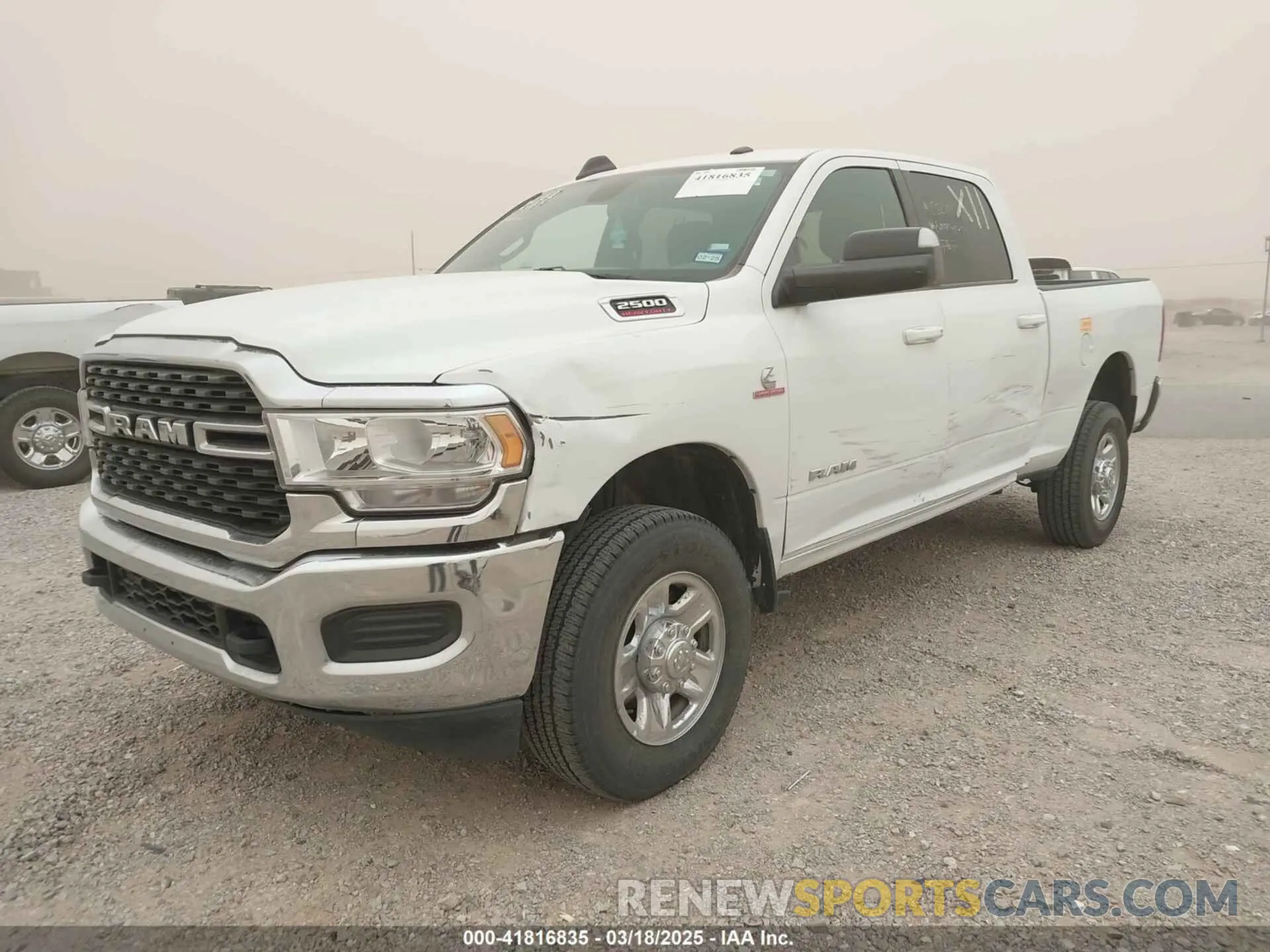 2 Photograph of a damaged car 3C6UR5DL1NG235817 RAM 2500 2022