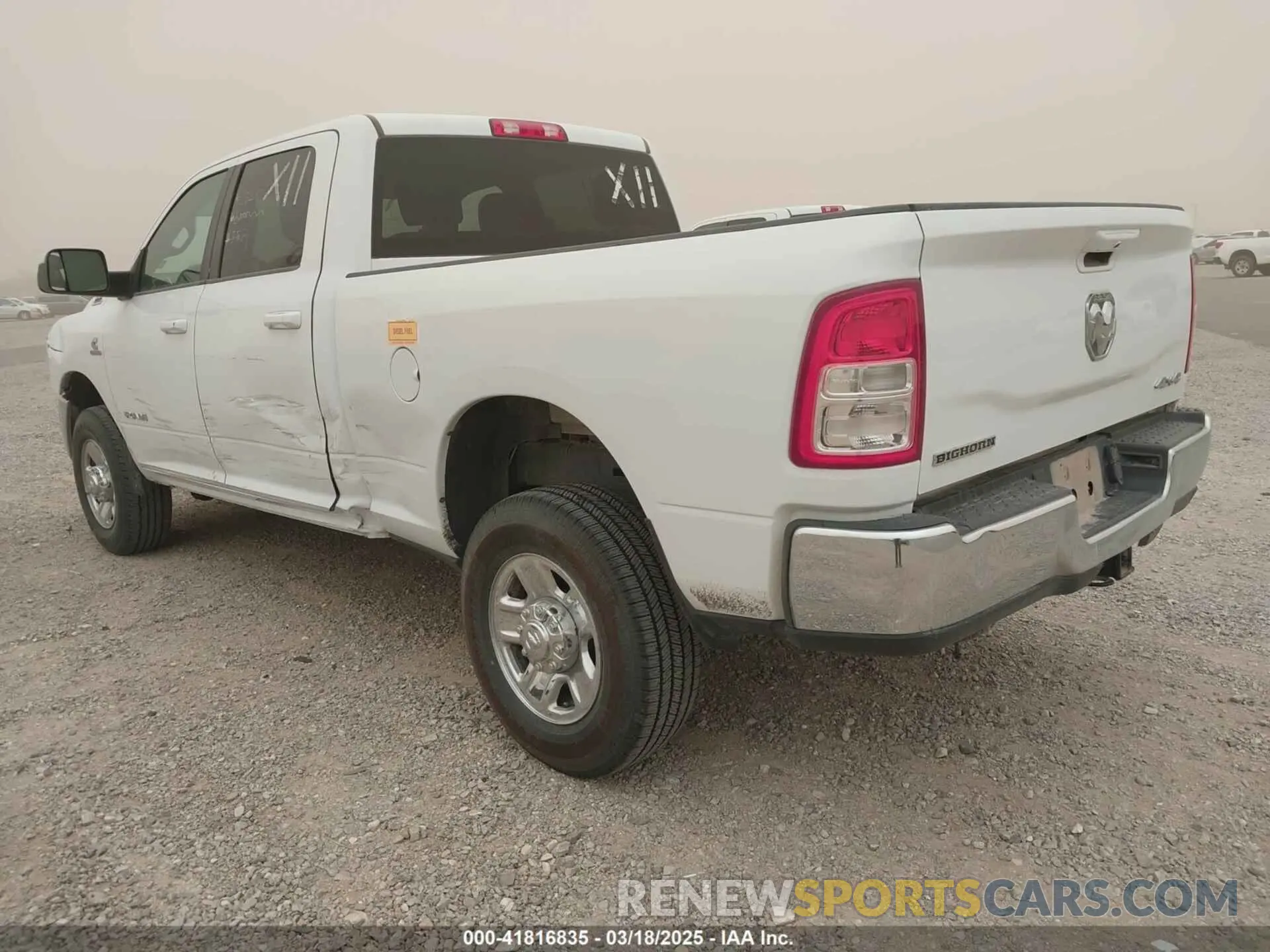 3 Photograph of a damaged car 3C6UR5DL1NG235817 RAM 2500 2022
