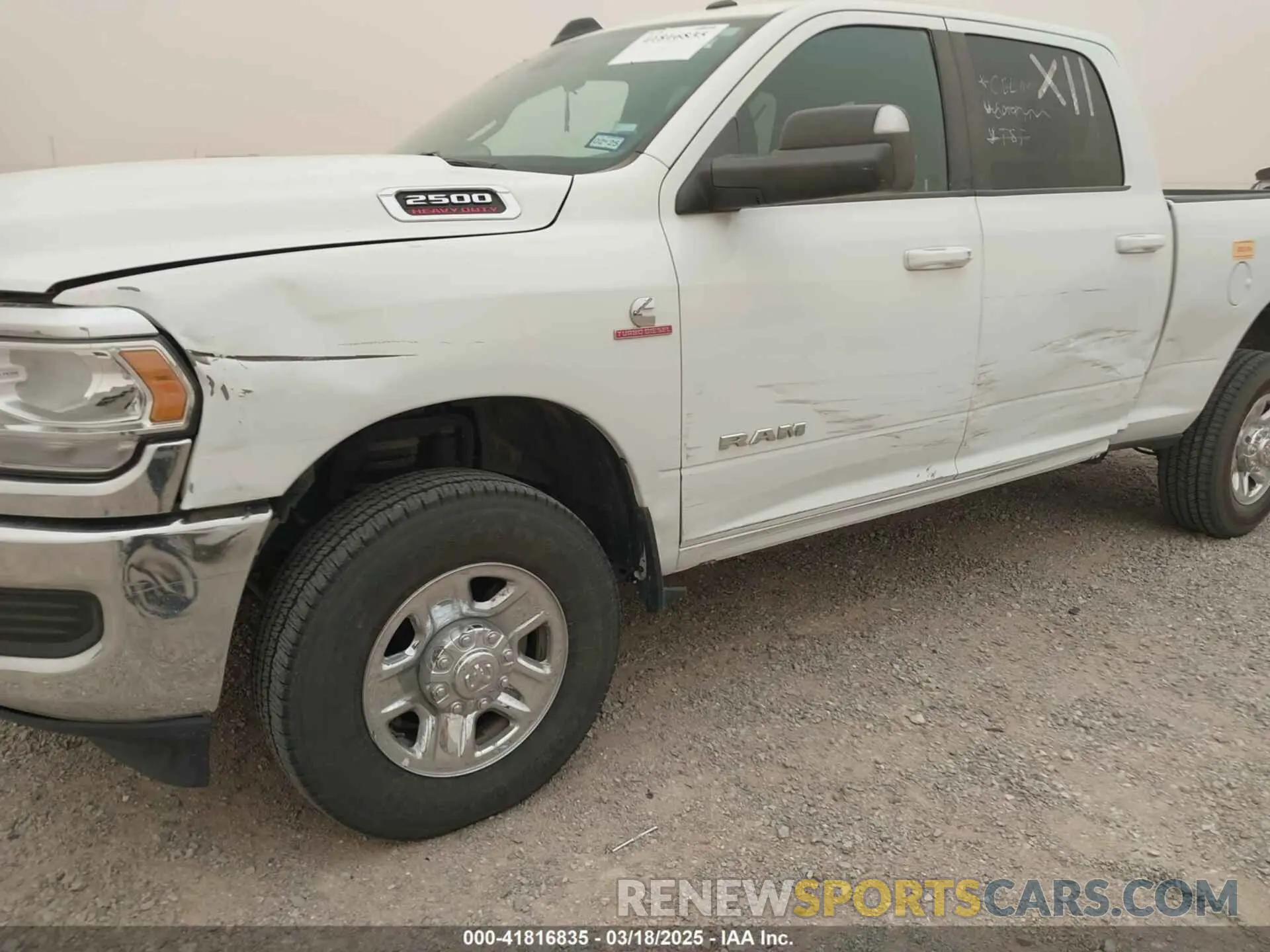 6 Photograph of a damaged car 3C6UR5DL1NG235817 RAM 2500 2022
