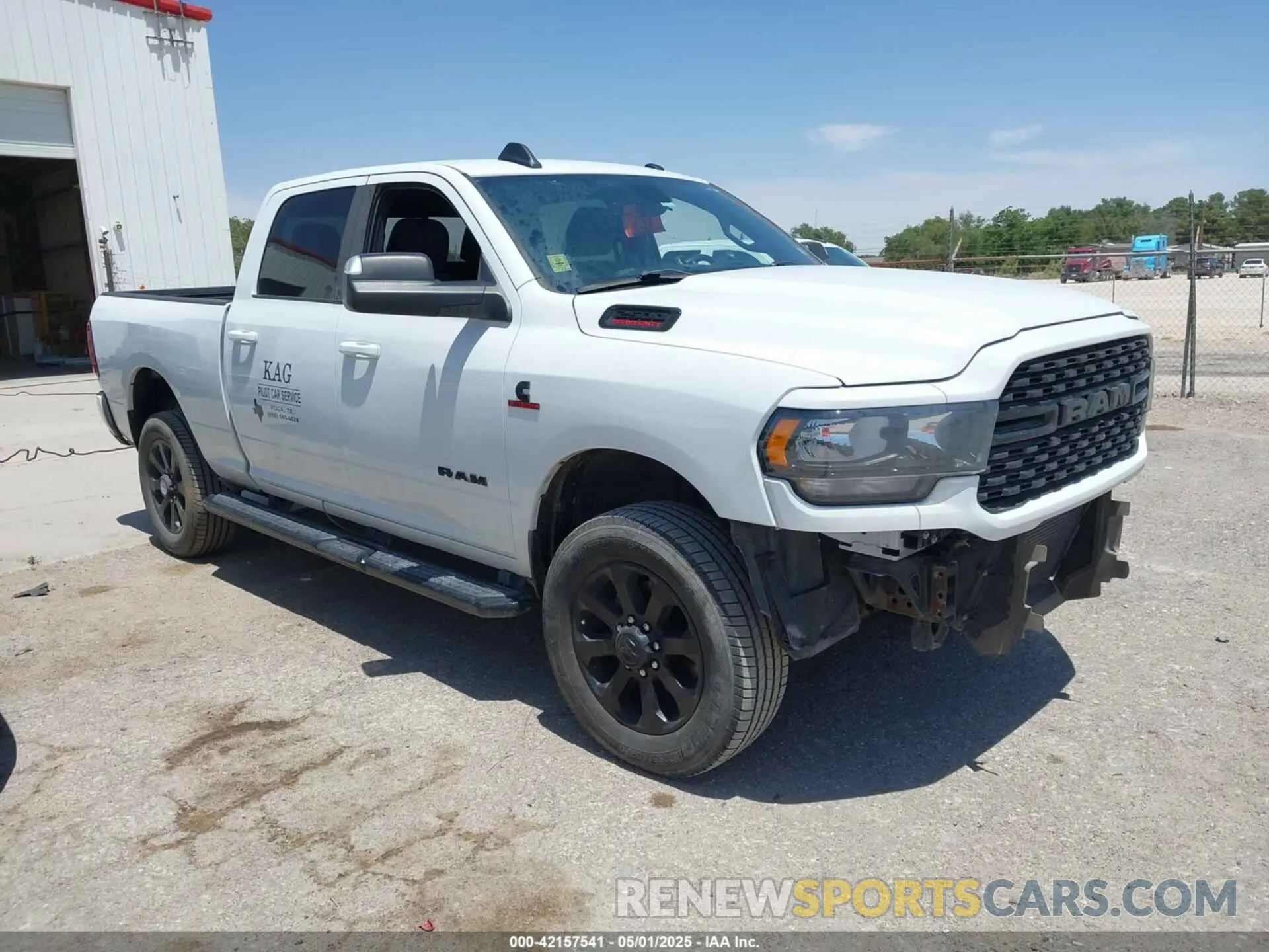 1 Photograph of a damaged car 3C6UR5DL2NG314588 RAM 2500 2022