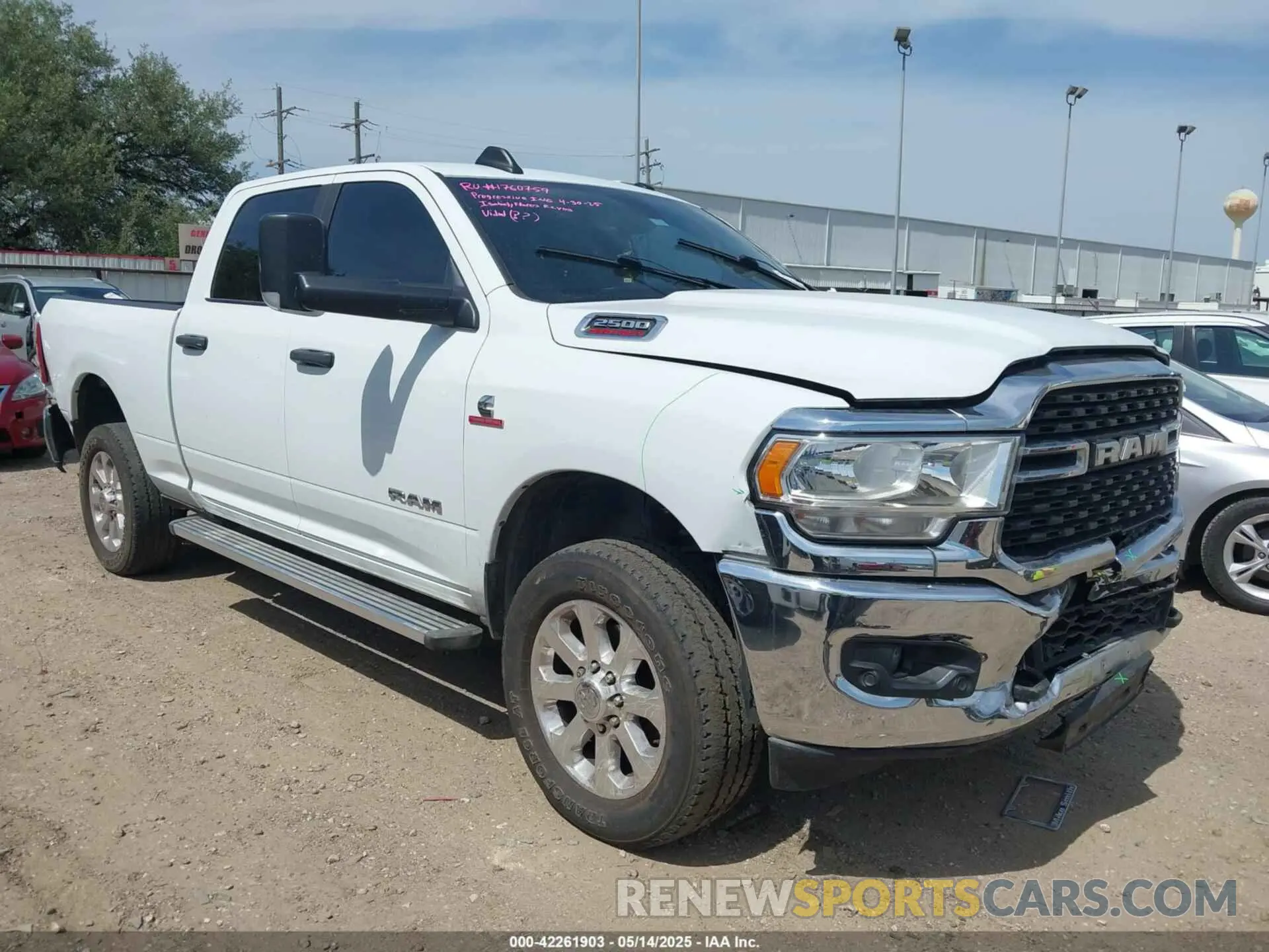 1 Photograph of a damaged car 3C6UR5DL2NG350071 RAM 2500 2022