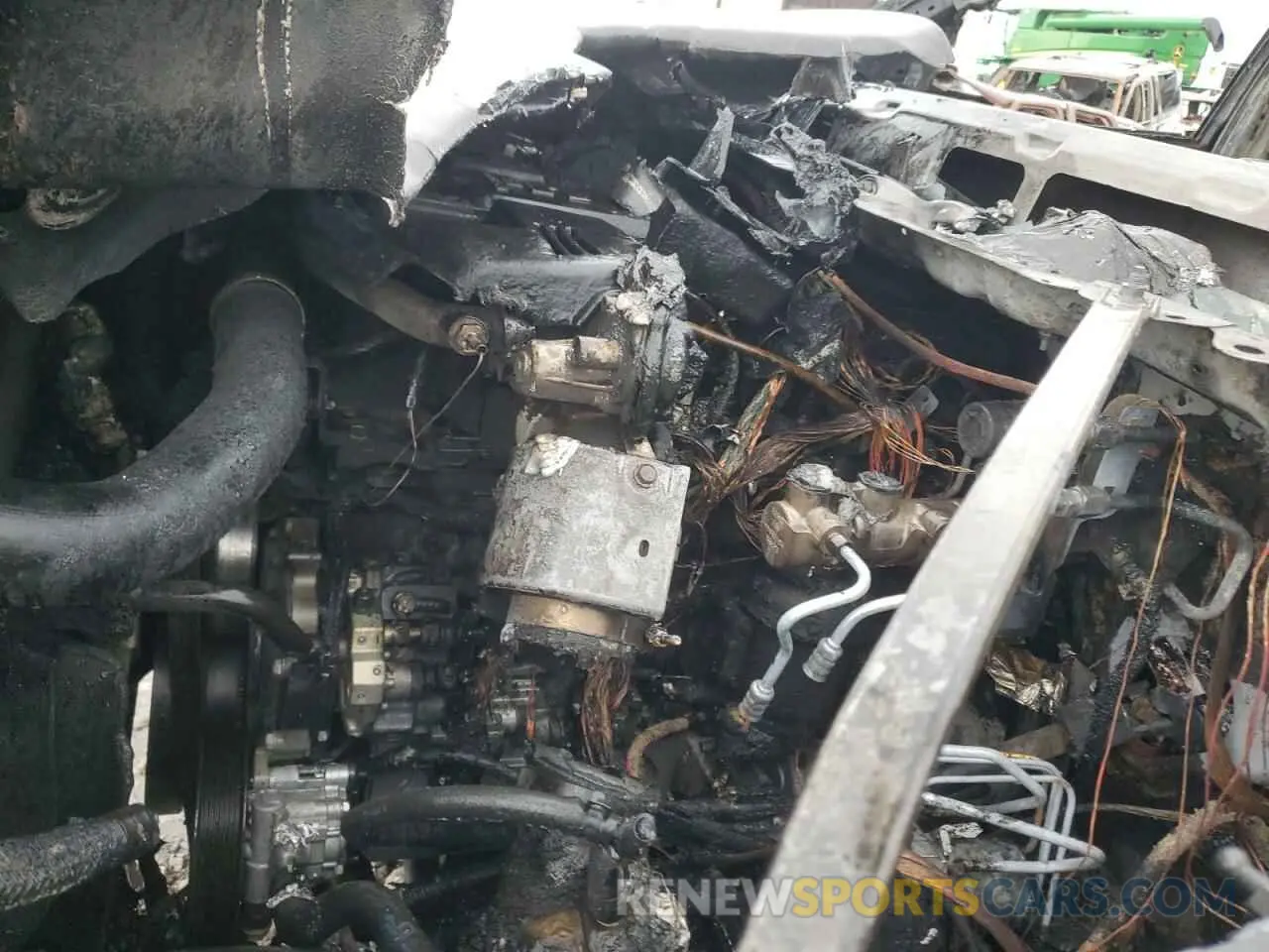 11 Photograph of a damaged car 3C6UR5DL4NG170848 RAM 2500 2022