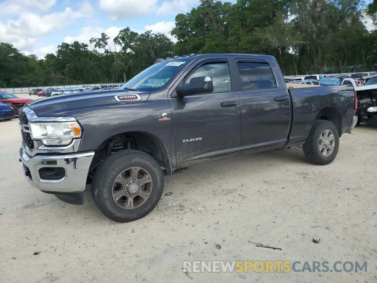 1 Photograph of a damaged car 3C6UR5DL4NG380267 RAM 2500 2022