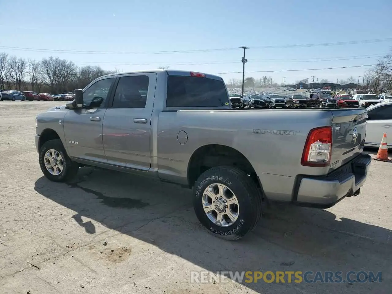 2 Photograph of a damaged car 3C6UR5DL5NG147112 RAM 2500 2022