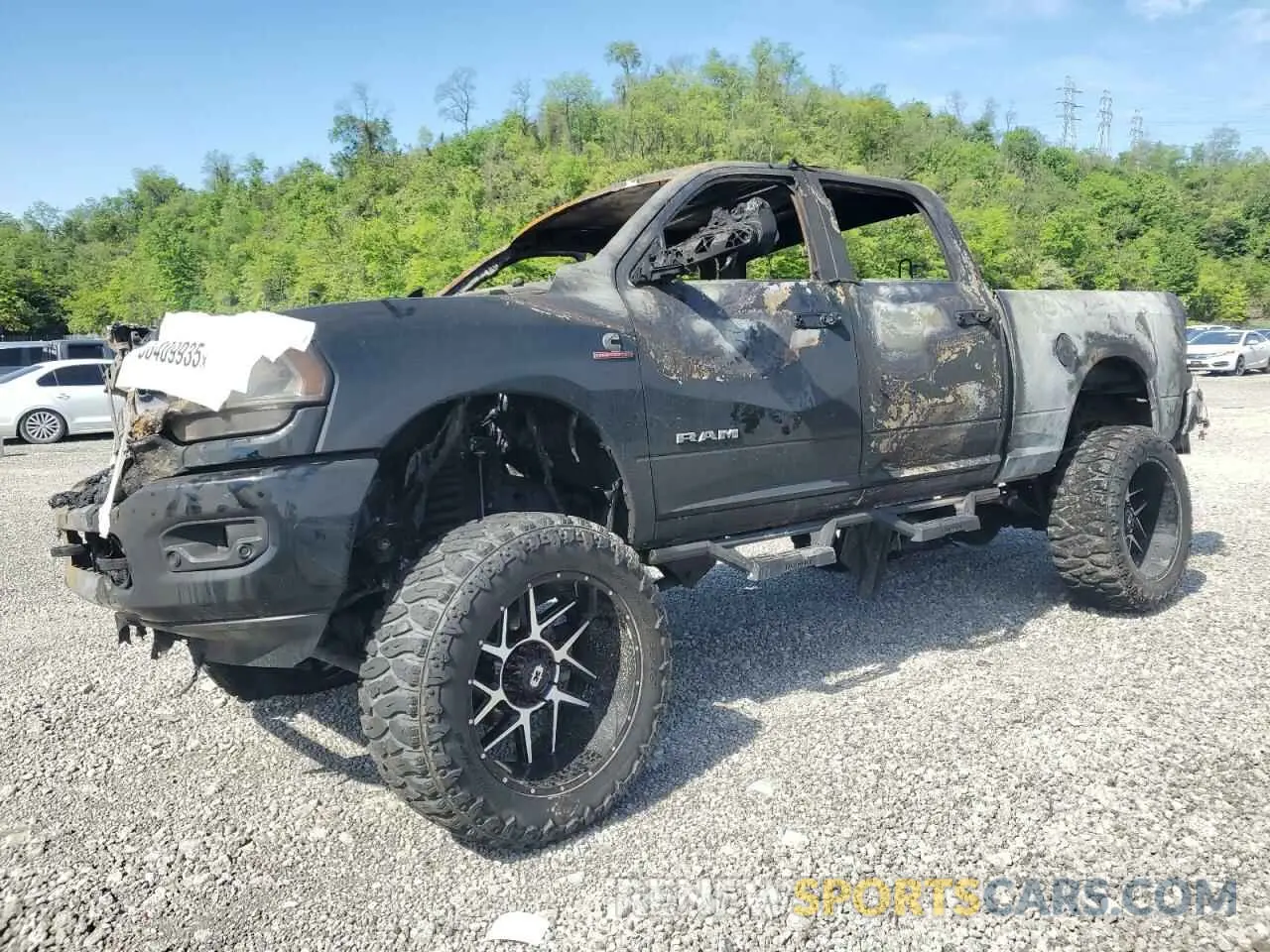 1 Photograph of a damaged car 3C6UR5DL8NG262772 RAM 2500 2022
