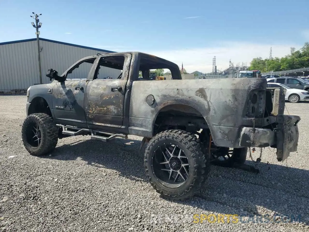 2 Photograph of a damaged car 3C6UR5DL8NG262772 RAM 2500 2022
