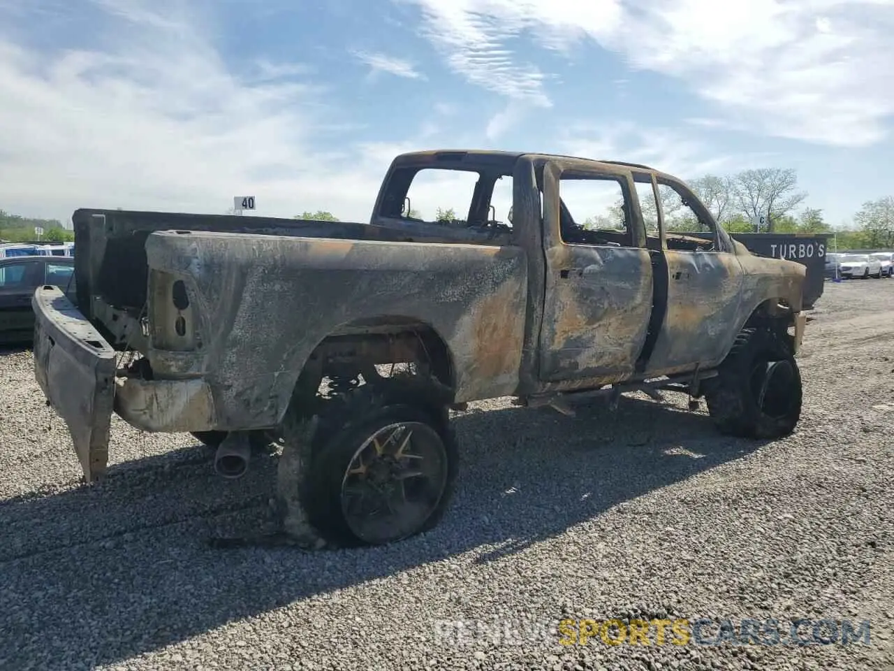 3 Photograph of a damaged car 3C6UR5DL8NG262772 RAM 2500 2022