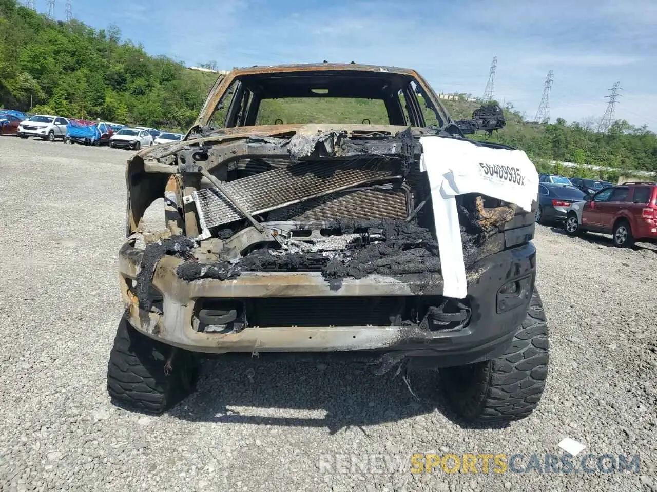 5 Photograph of a damaged car 3C6UR5DL8NG262772 RAM 2500 2022