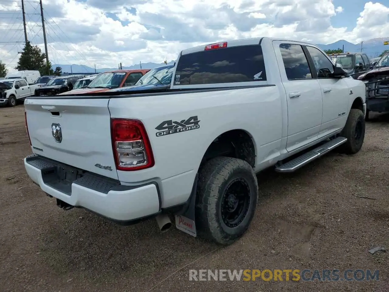 3 Photograph of a damaged car 3C6UR5DLXNG183393 RAM 2500 2022