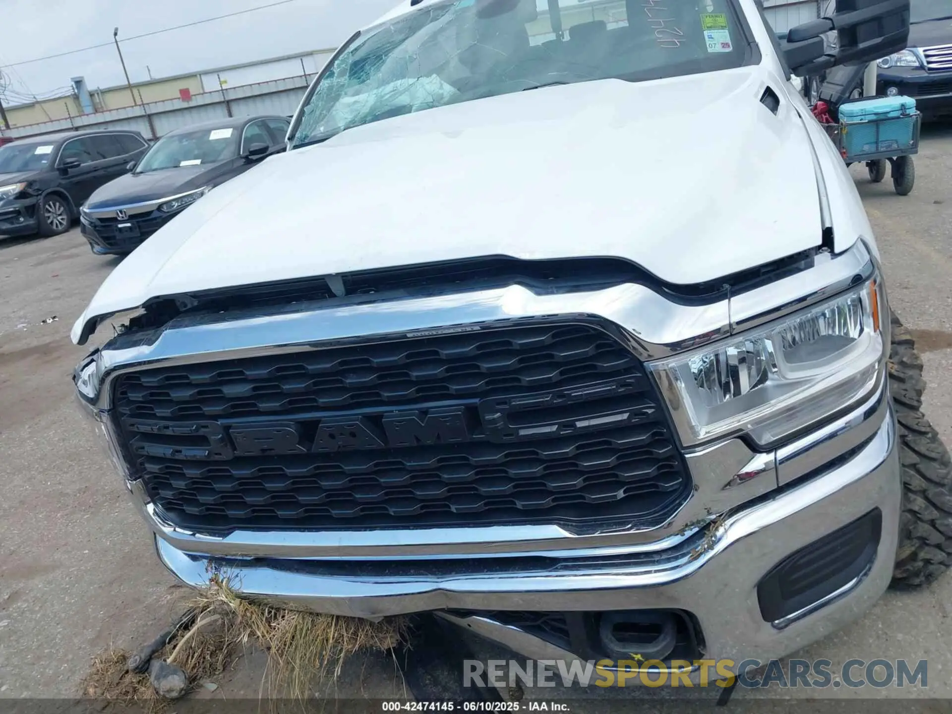 11 Photograph of a damaged car 3C6UR5DLXNG436311 RAM 2500 2022