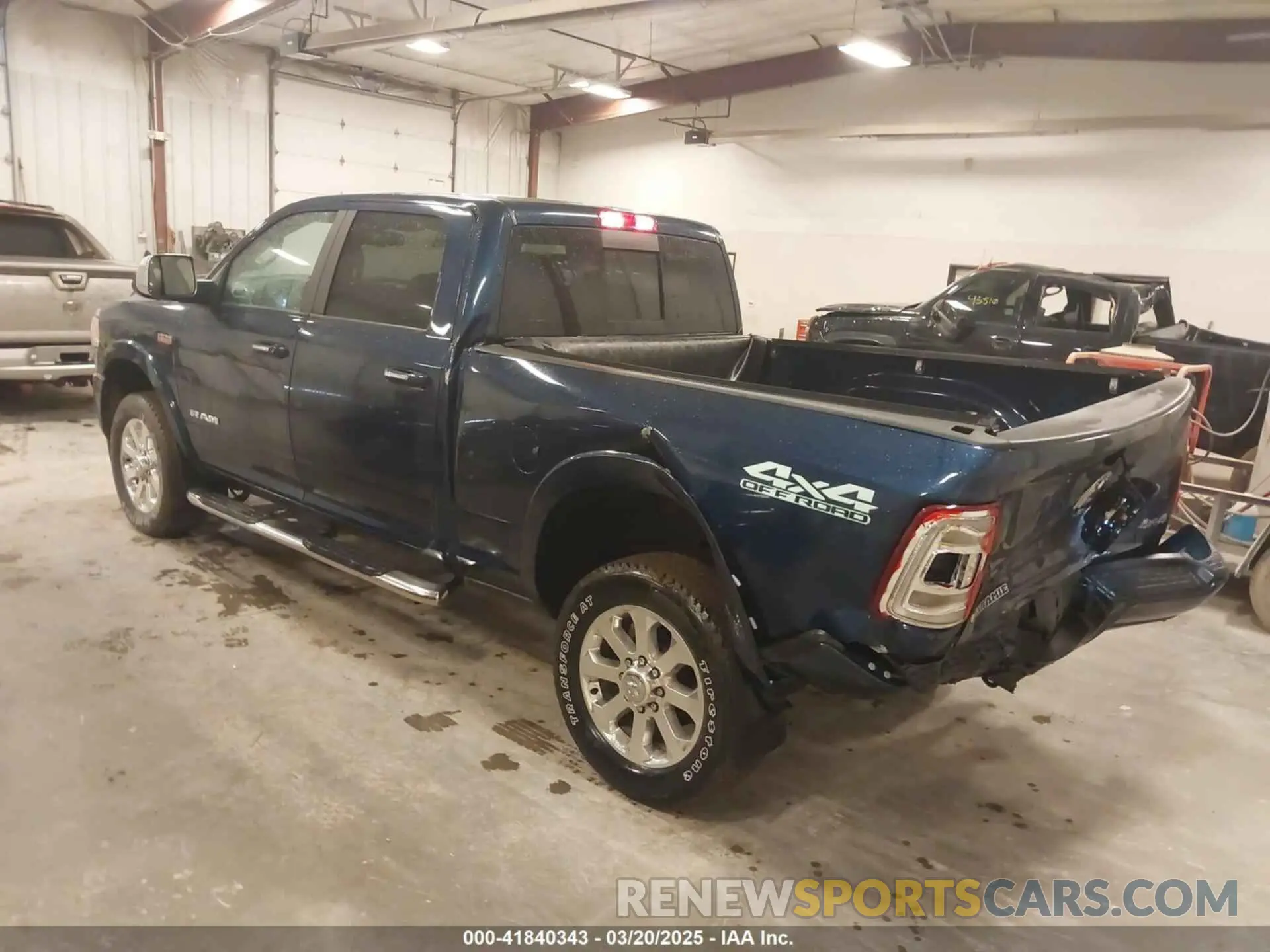 3 Photograph of a damaged car 3C6UR5FJ0NG370184 RAM 2500 2022
