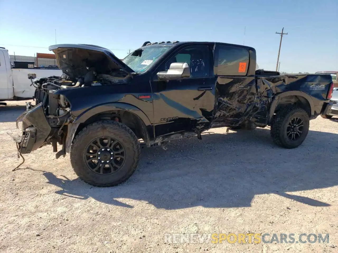 1 Photograph of a damaged car 3C6UR5FJ2NG144079 RAM 2500 2022