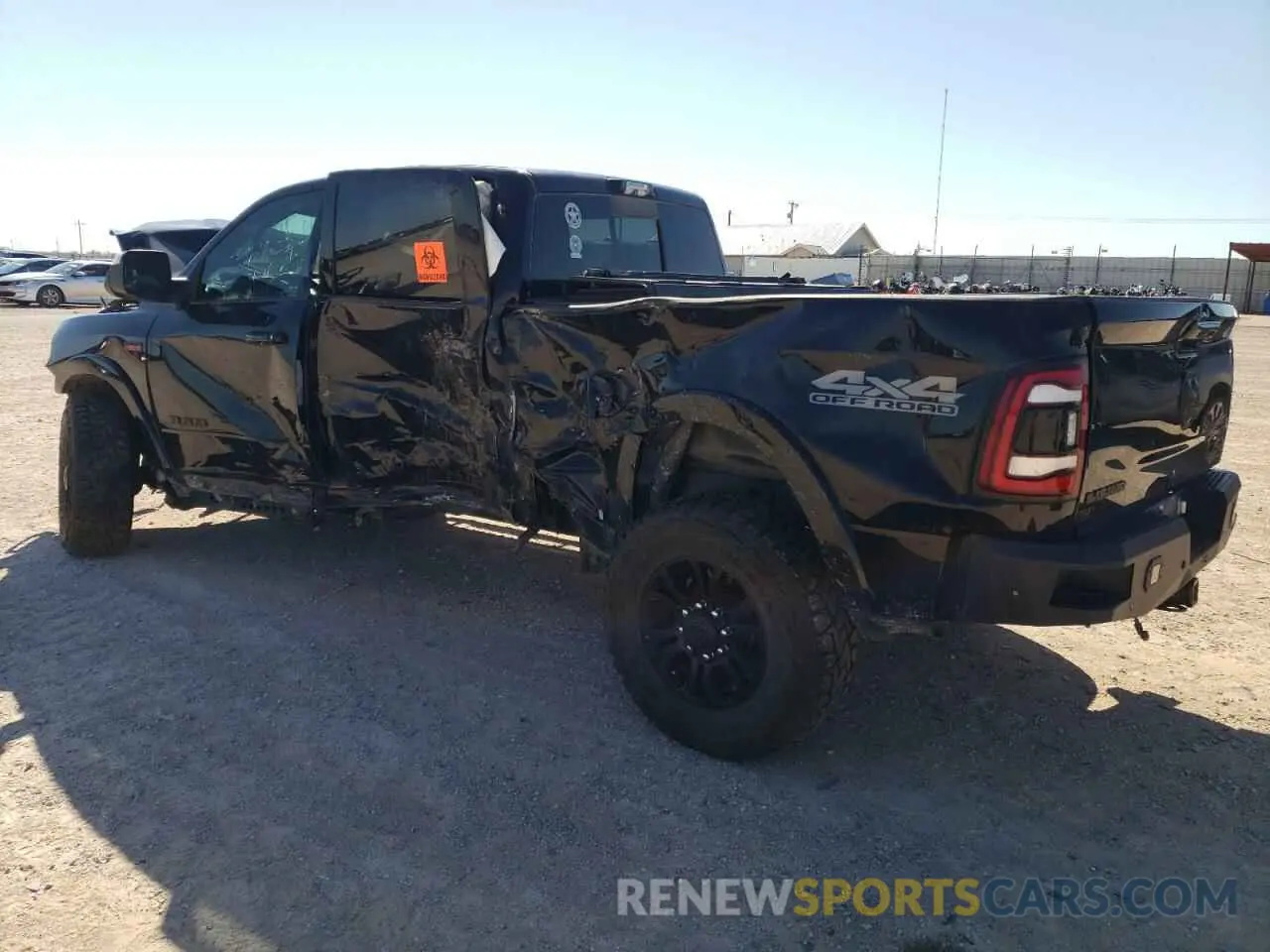 2 Photograph of a damaged car 3C6UR5FJ2NG144079 RAM 2500 2022