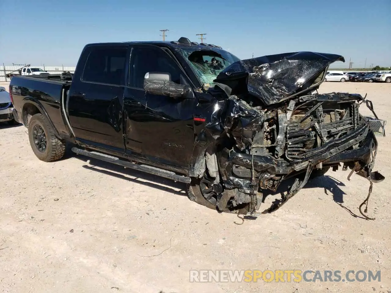 4 Photograph of a damaged car 3C6UR5FJ2NG144079 RAM 2500 2022