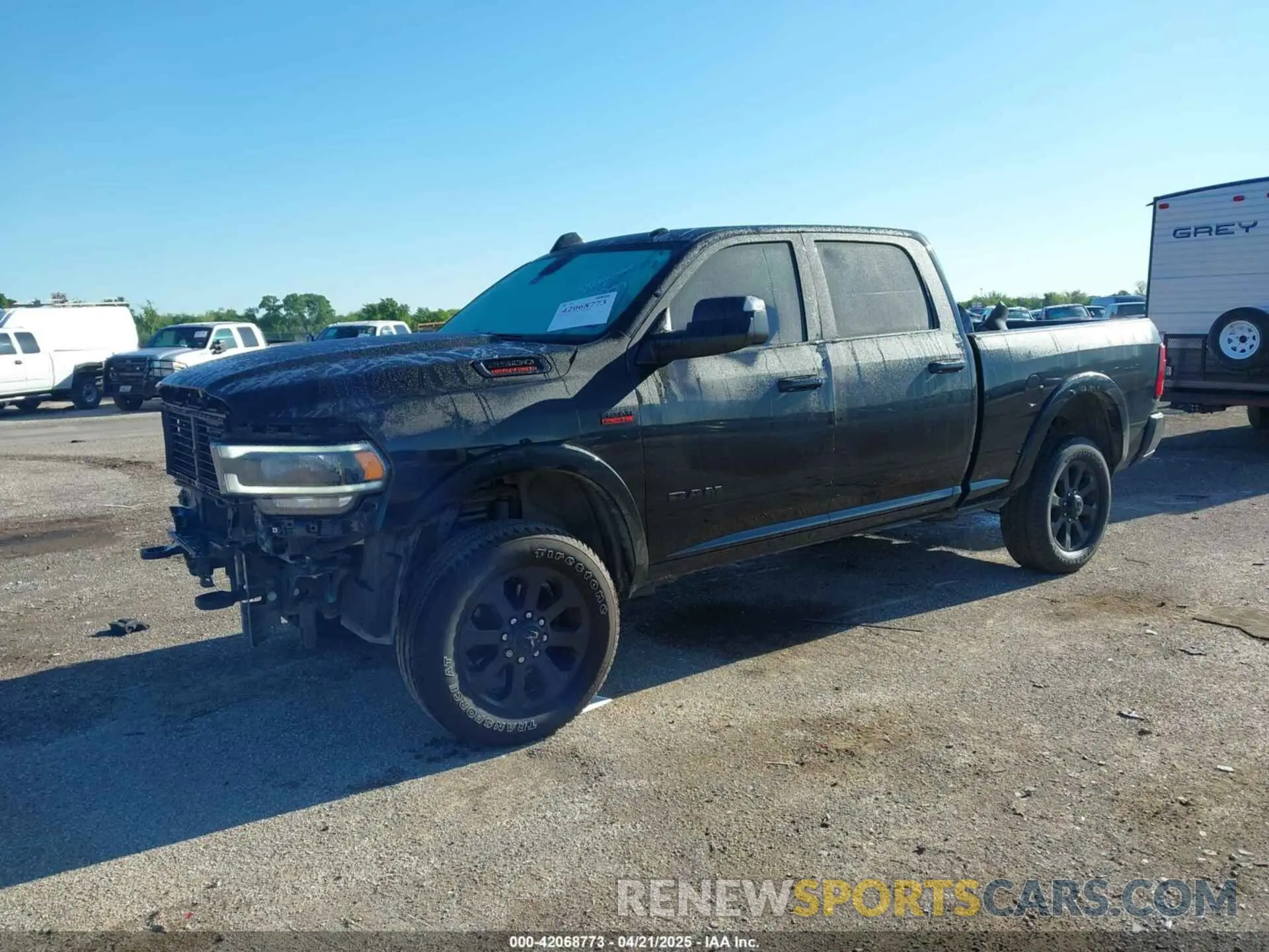 2 Photograph of a damaged car 3C6UR5FJ3NG131647 RAM 2500 2022