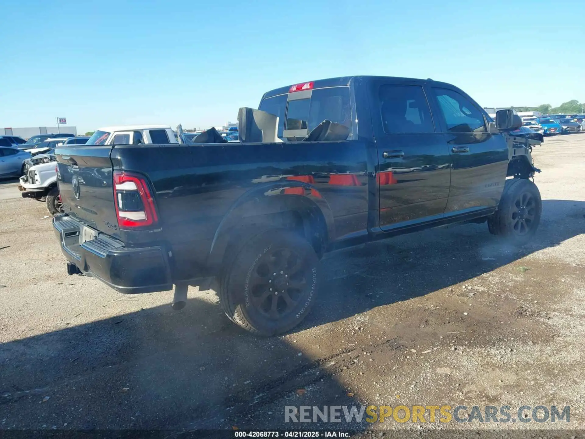 4 Photograph of a damaged car 3C6UR5FJ3NG131647 RAM 2500 2022