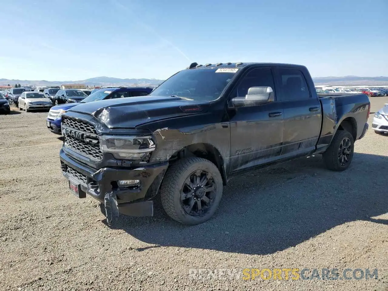 1 Photograph of a damaged car 3C6UR5FL1NG335574 RAM 2500 2022