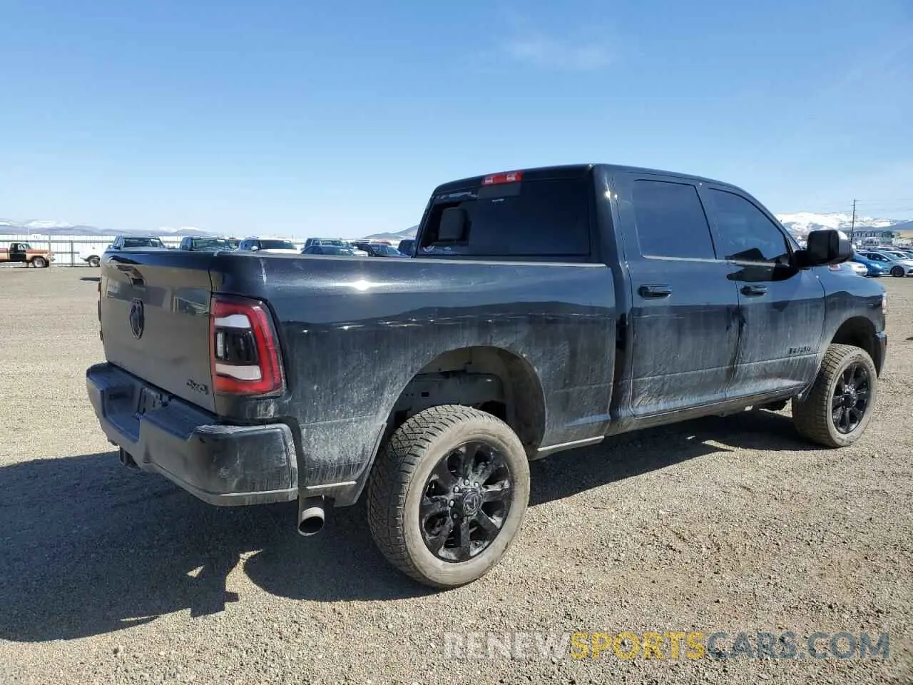 3 Photograph of a damaged car 3C6UR5FL1NG335574 RAM 2500 2022