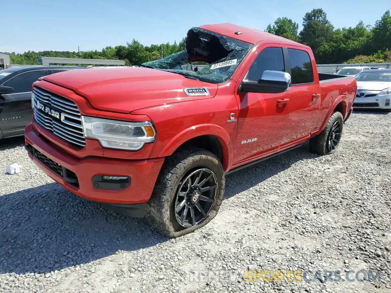 1 Photograph of a damaged car 3C6UR5FL5NG212540 RAM 2500 2022