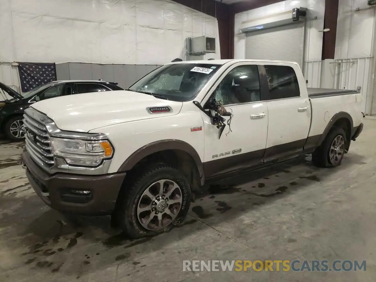 1 Photograph of a damaged car 3C6UR5GJ6NG267446 RAM 2500 2022