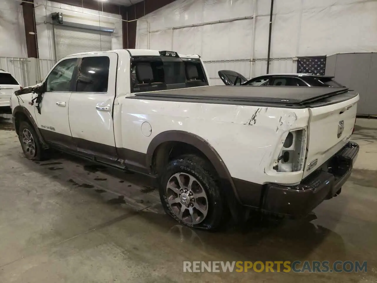 2 Photograph of a damaged car 3C6UR5GJ6NG267446 RAM 2500 2022
