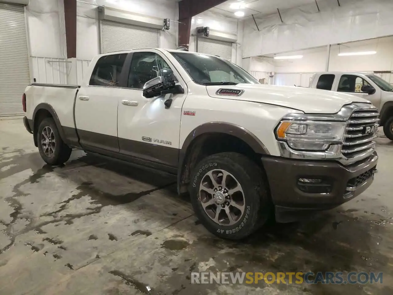 4 Photograph of a damaged car 3C6UR5GJ6NG267446 RAM 2500 2022