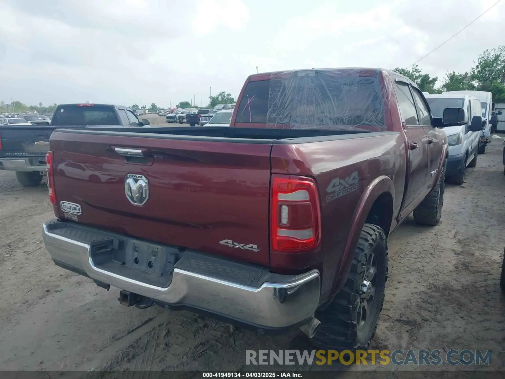 4 Photograph of a damaged car 3C6UR5GL1NG186095 RAM 2500 2022