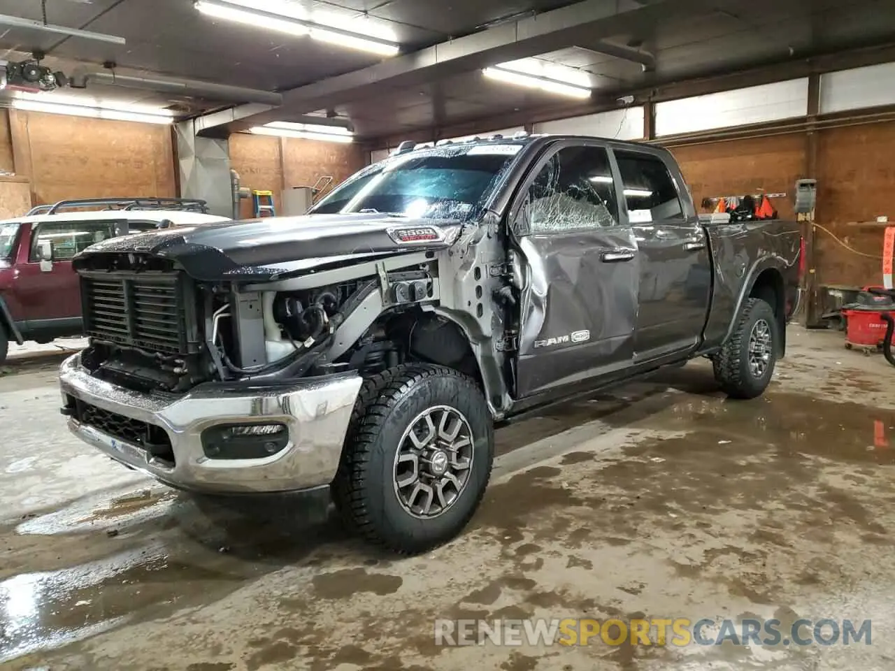 1 Photograph of a damaged car 3C6UR5GL8NG193514 RAM 2500 2022