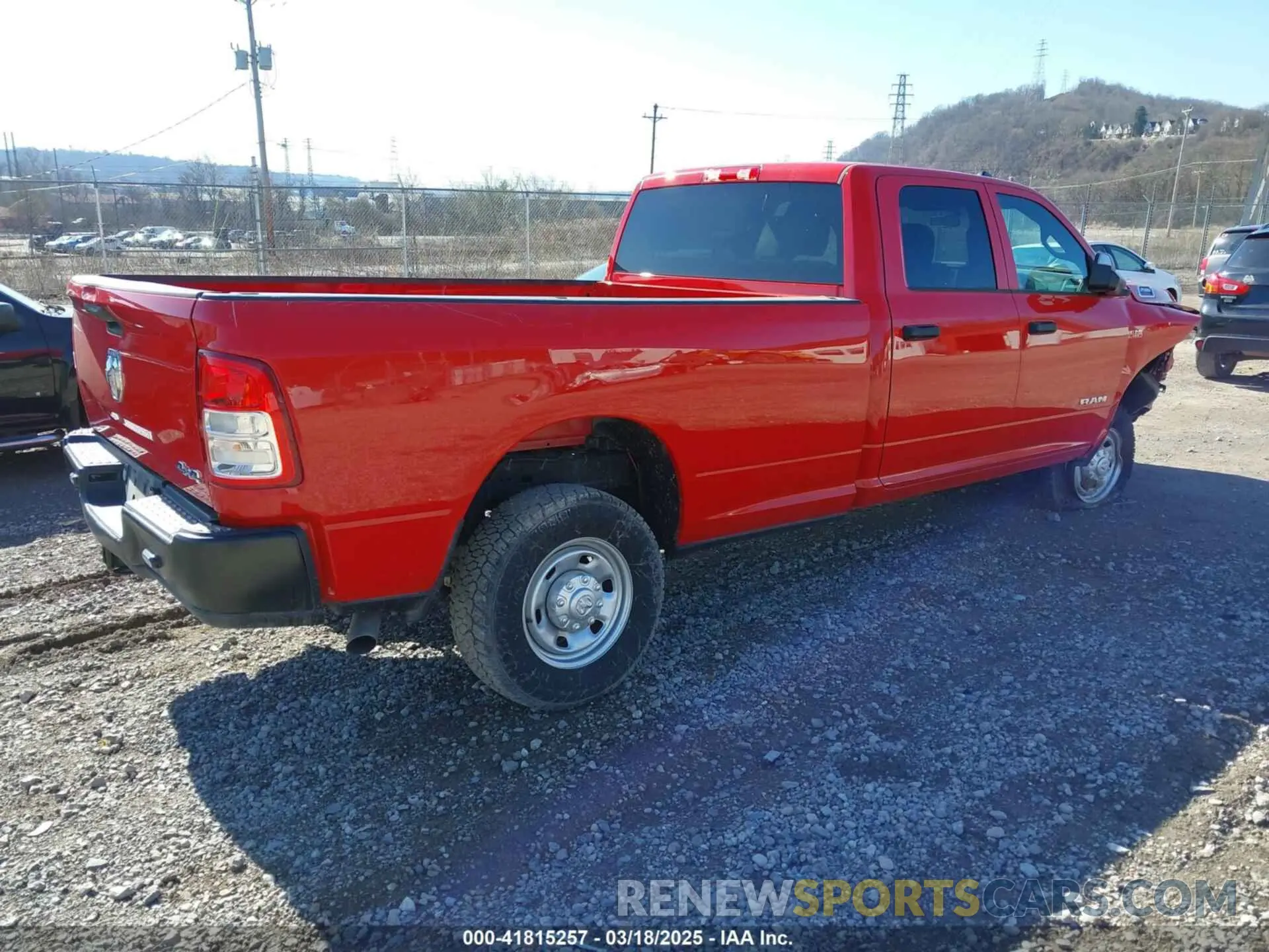 4 Photograph of a damaged car 3C6UR5HJ1NG365279 RAM 2500 2022