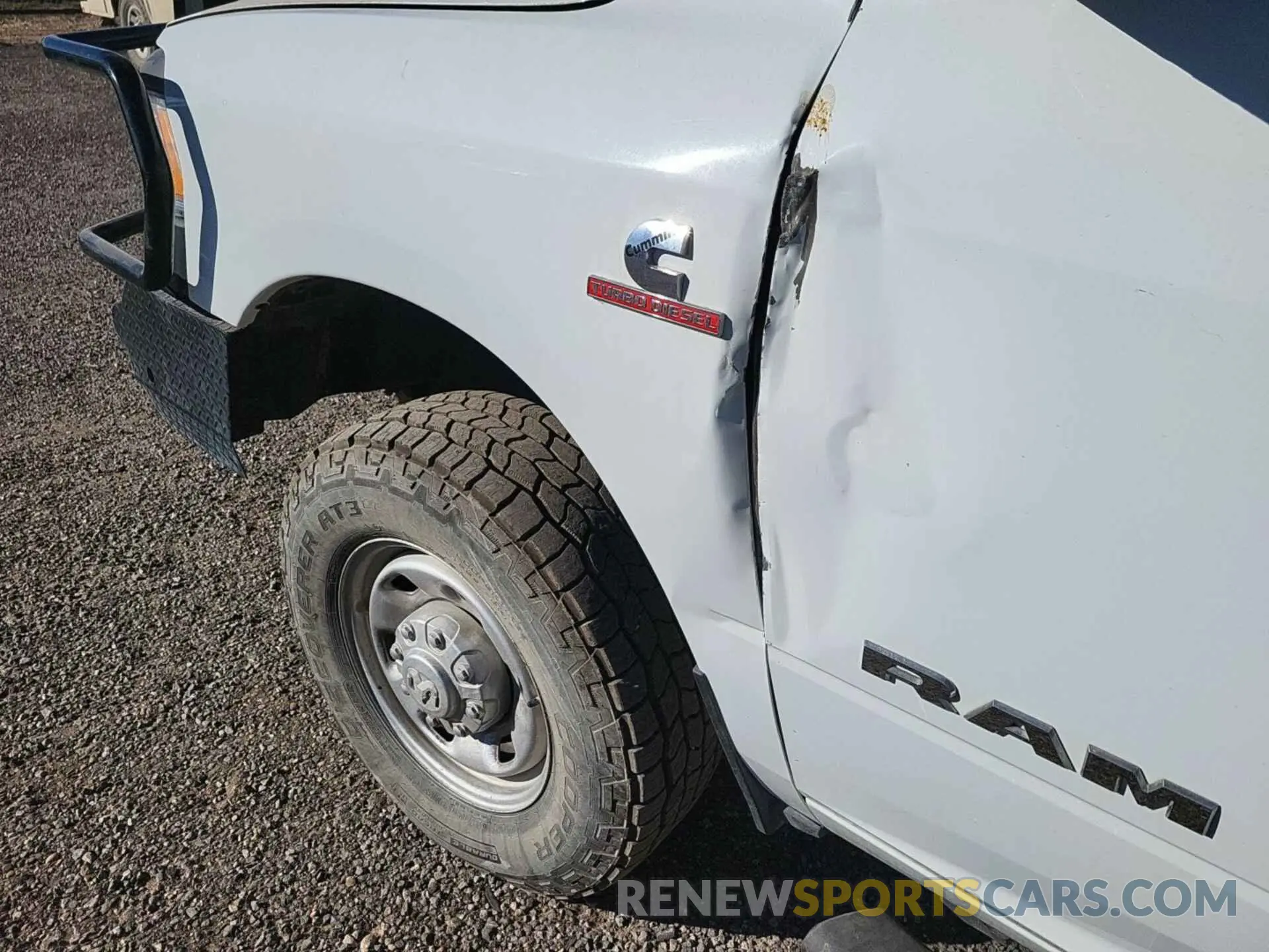 30 Photograph of a damaged car 3C6UR5HL6NG405499 RAM 2500 2022