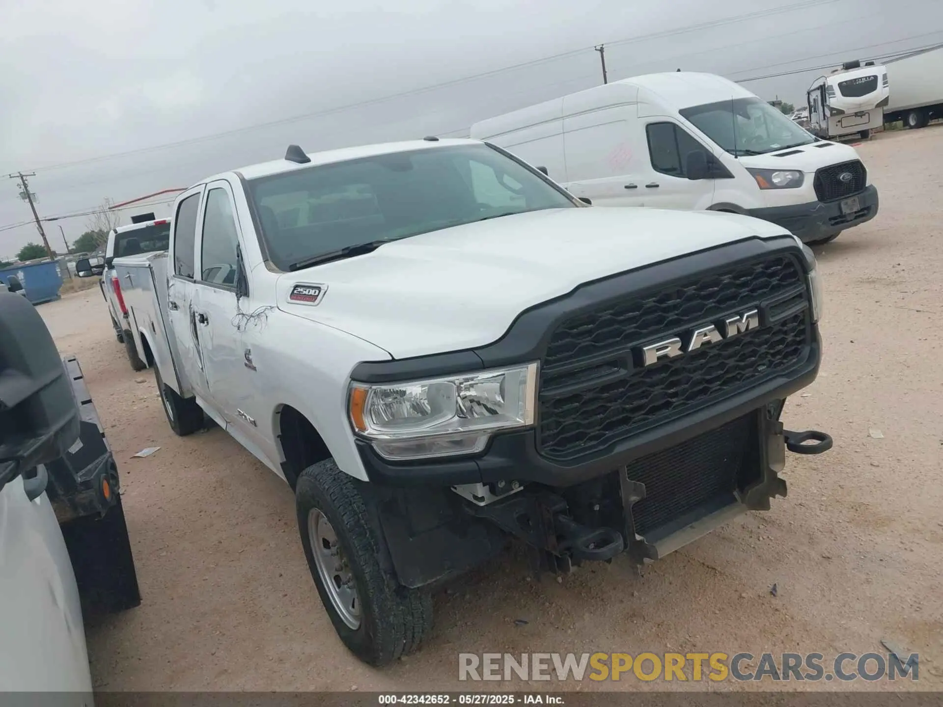 13 Photograph of a damaged car 3C6UR5HLXNG241660 RAM 2500 2022