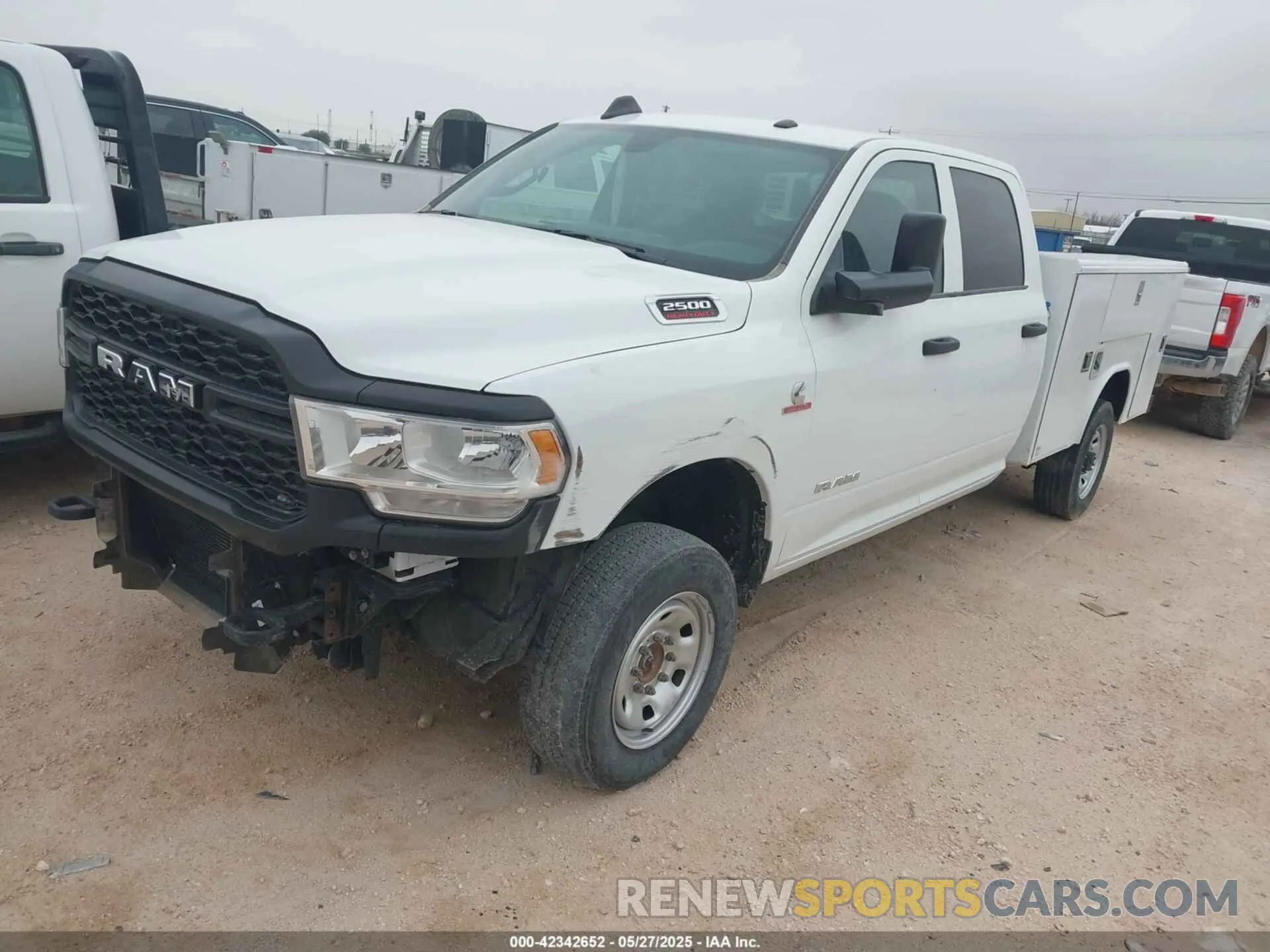 2 Photograph of a damaged car 3C6UR5HLXNG241660 RAM 2500 2022