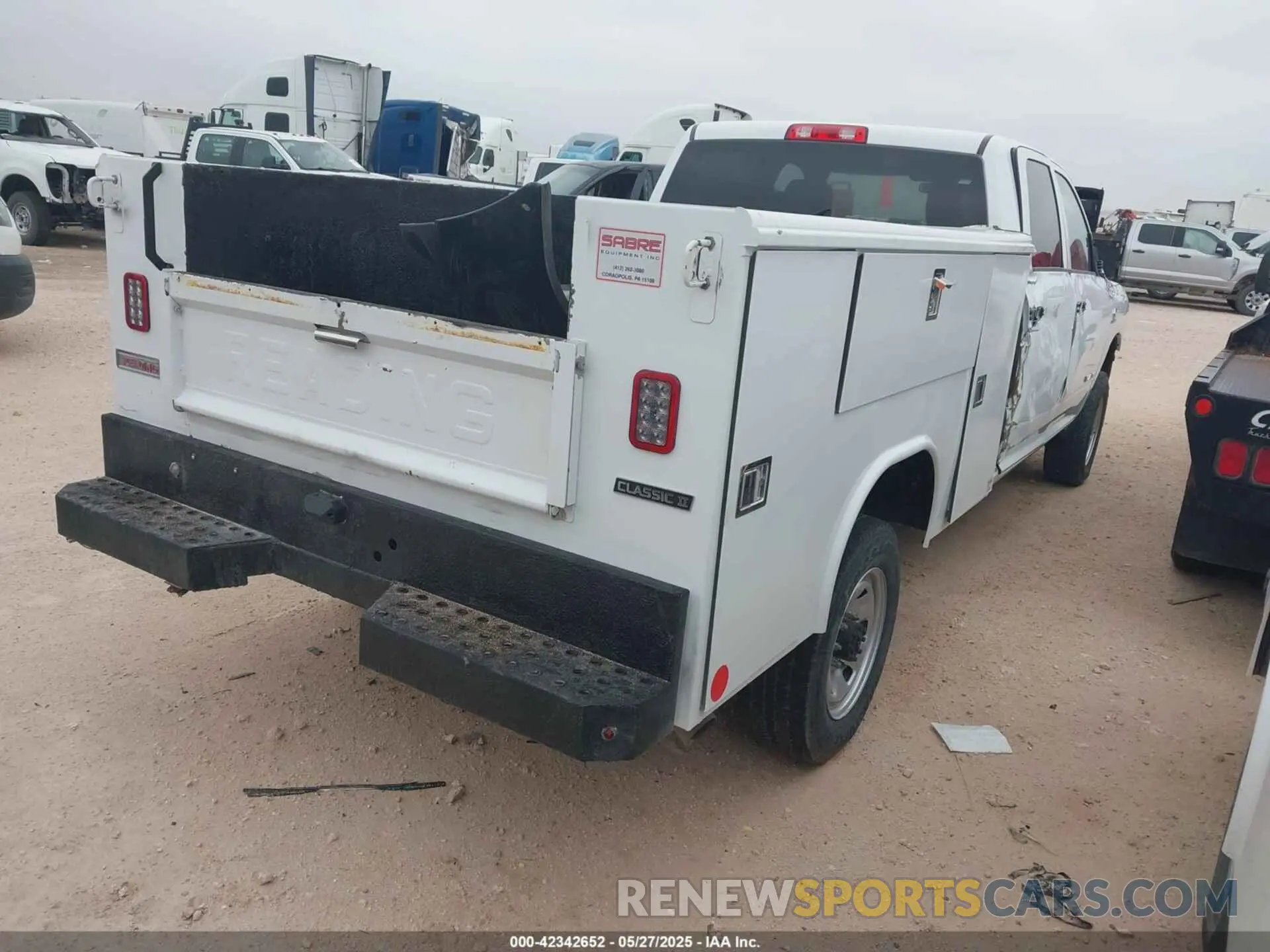 4 Photograph of a damaged car 3C6UR5HLXNG241660 RAM 2500 2022