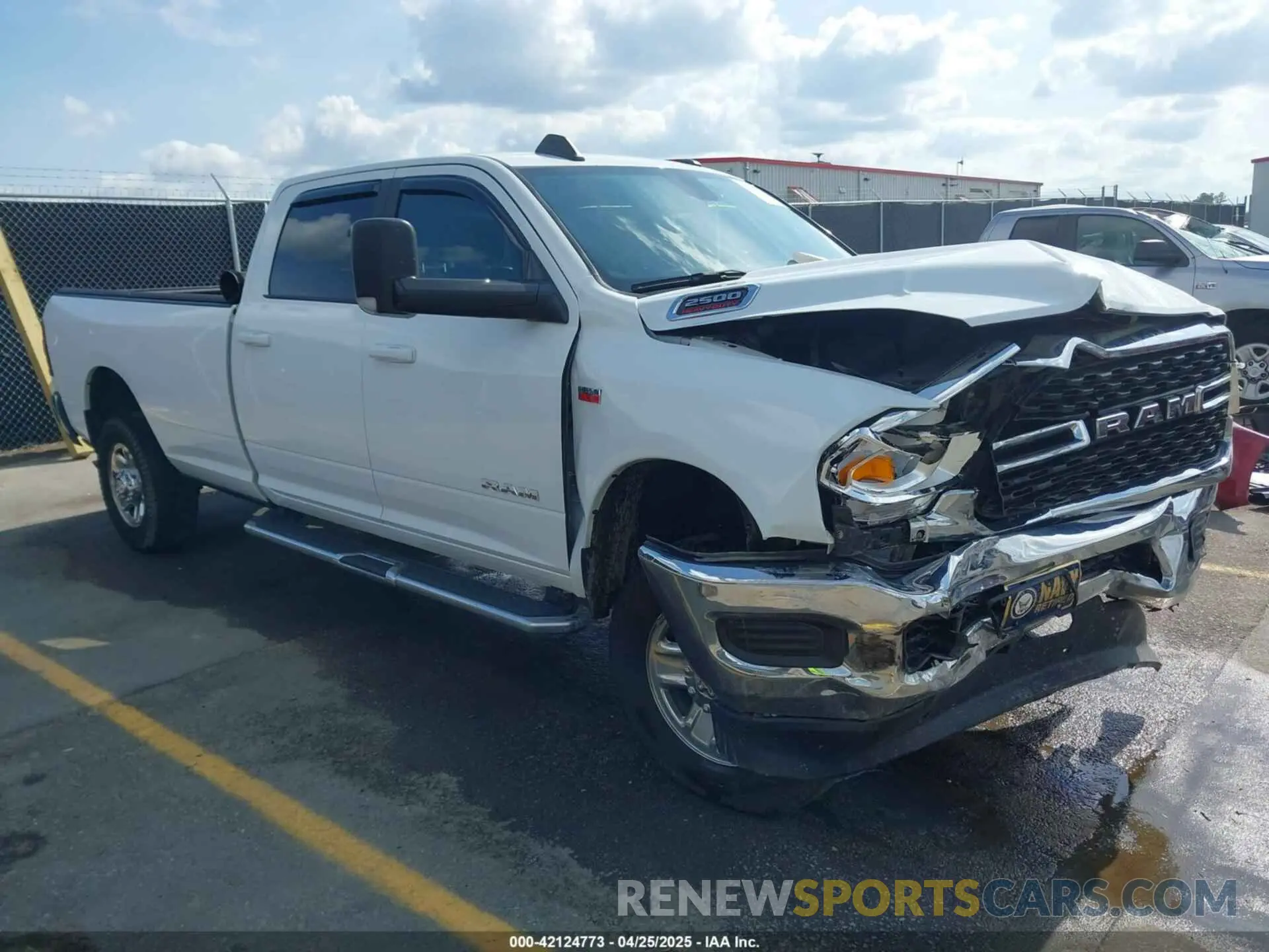 1 Photograph of a damaged car 3C6UR5JJ0NG248027 RAM 2500 2022
