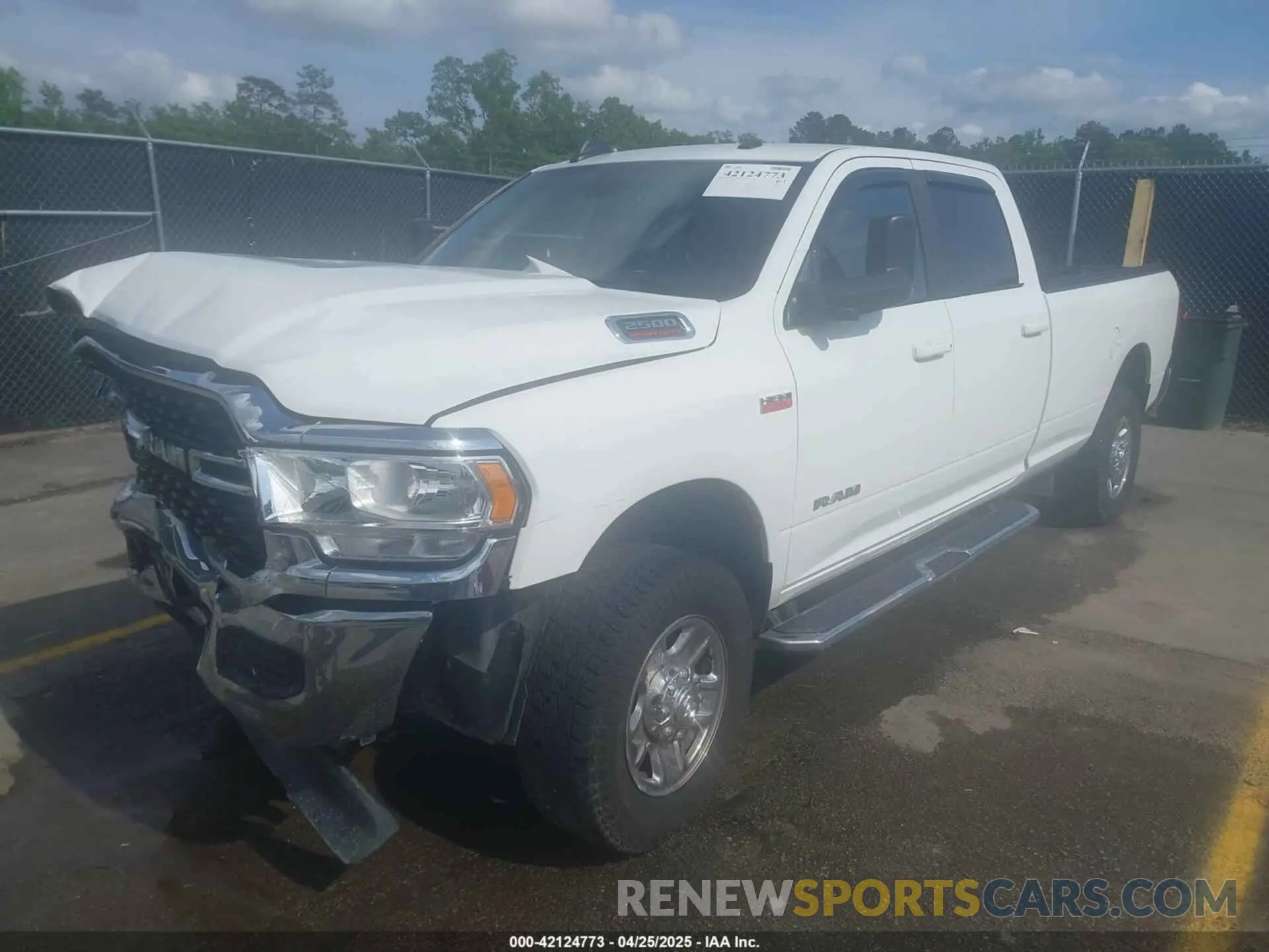 2 Photograph of a damaged car 3C6UR5JJ0NG248027 RAM 2500 2022