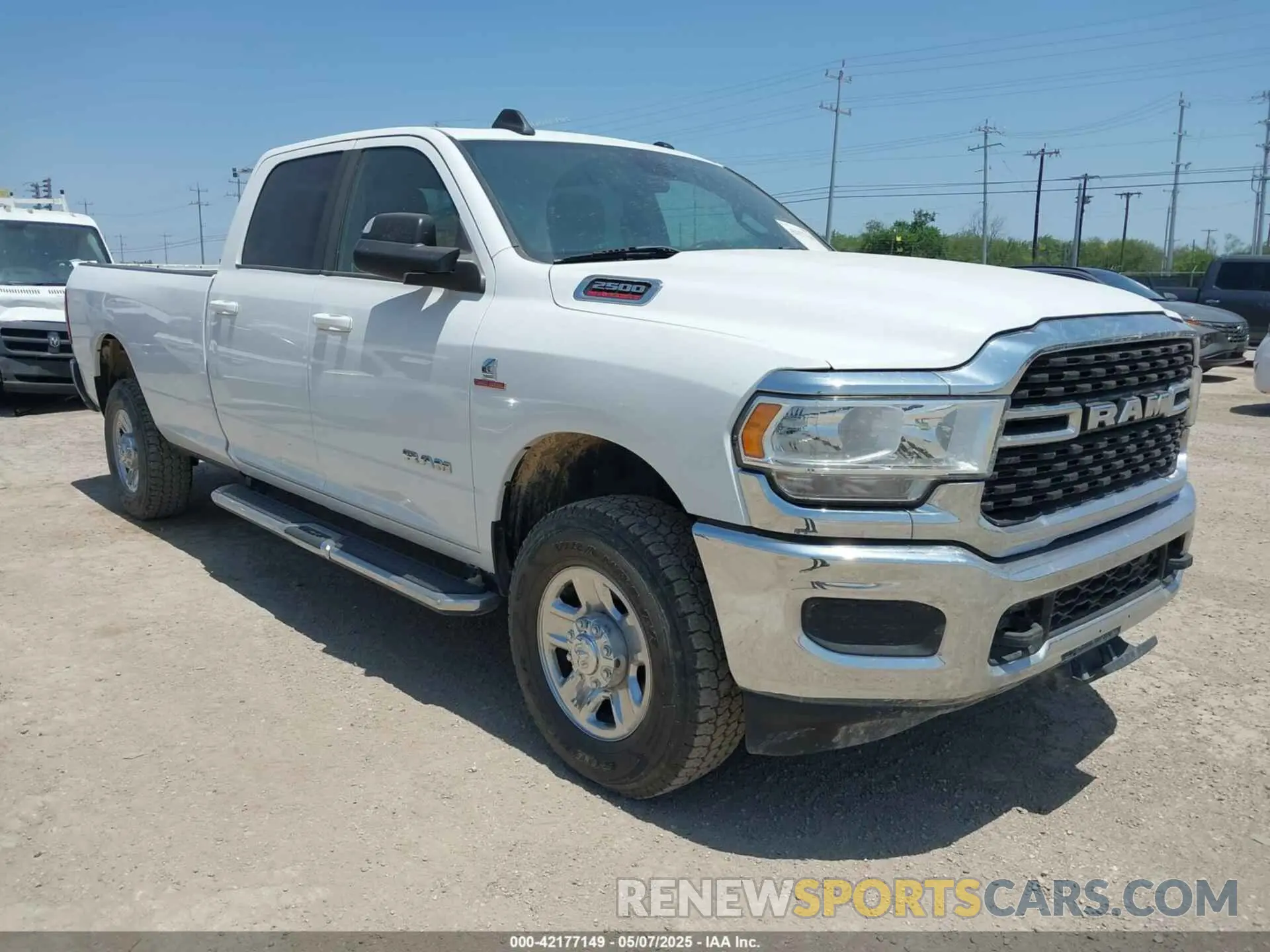 1 Photograph of a damaged car 3C6UR5JL1NG104343 RAM 2500 2022