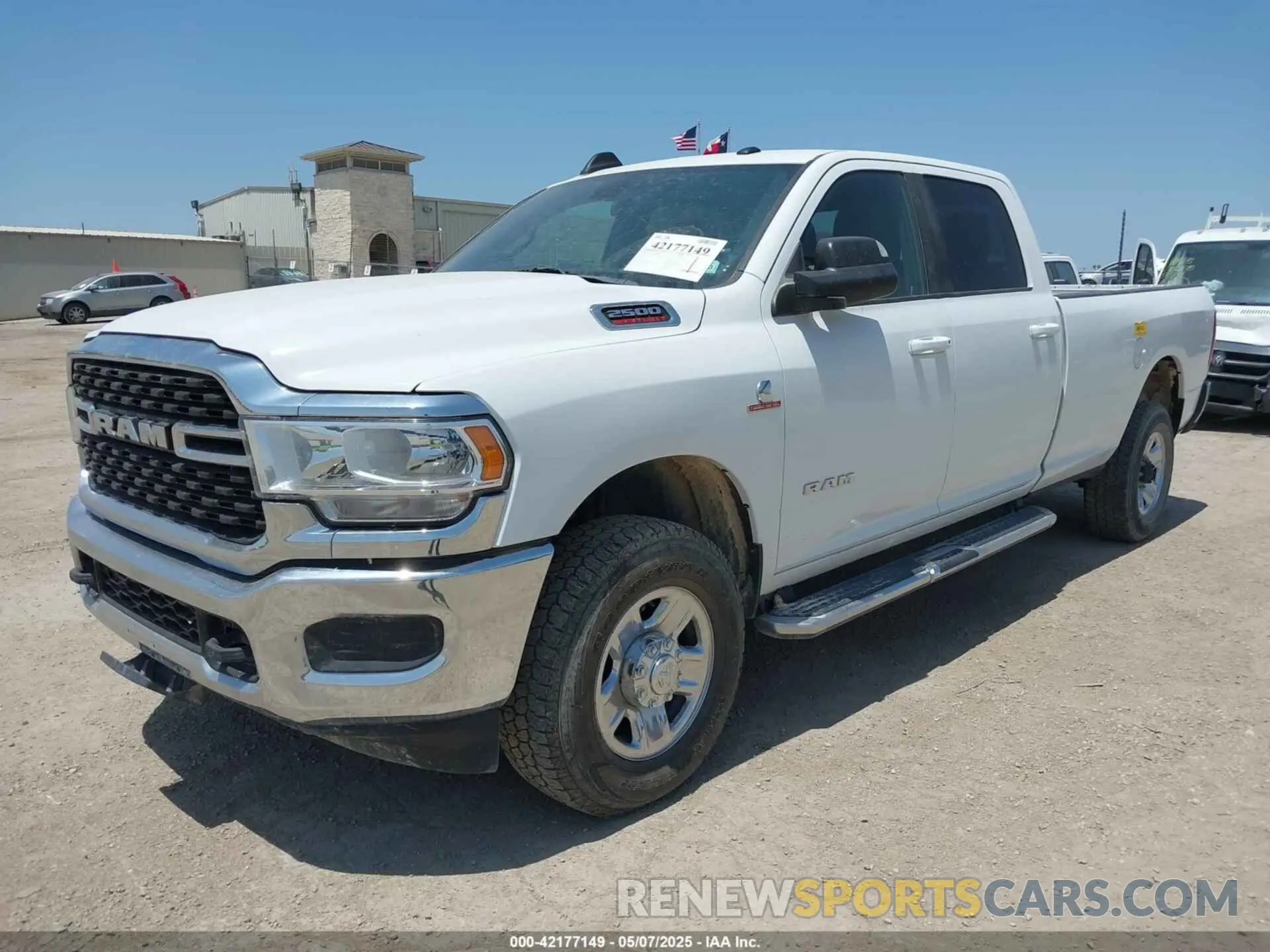 2 Photograph of a damaged car 3C6UR5JL1NG104343 RAM 2500 2022