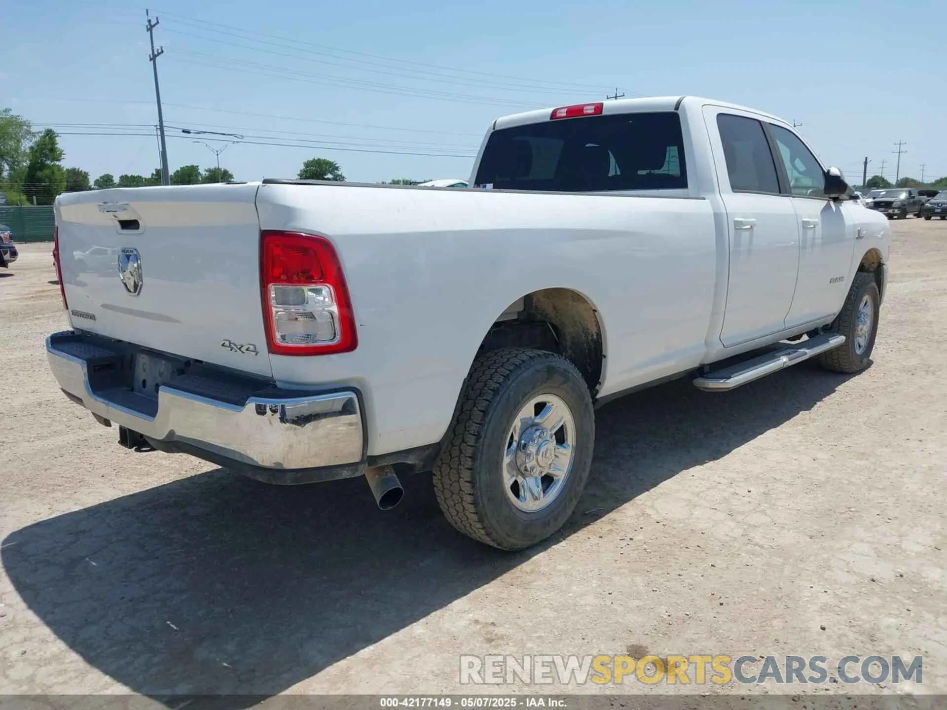 4 Photograph of a damaged car 3C6UR5JL1NG104343 RAM 2500 2022