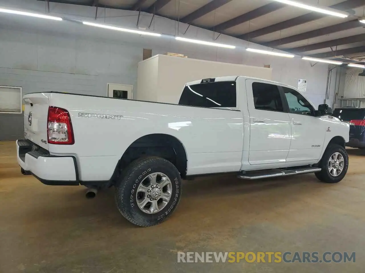 3 Photograph of a damaged car 3C6UR5JL4NG343756 RAM 2500 2022