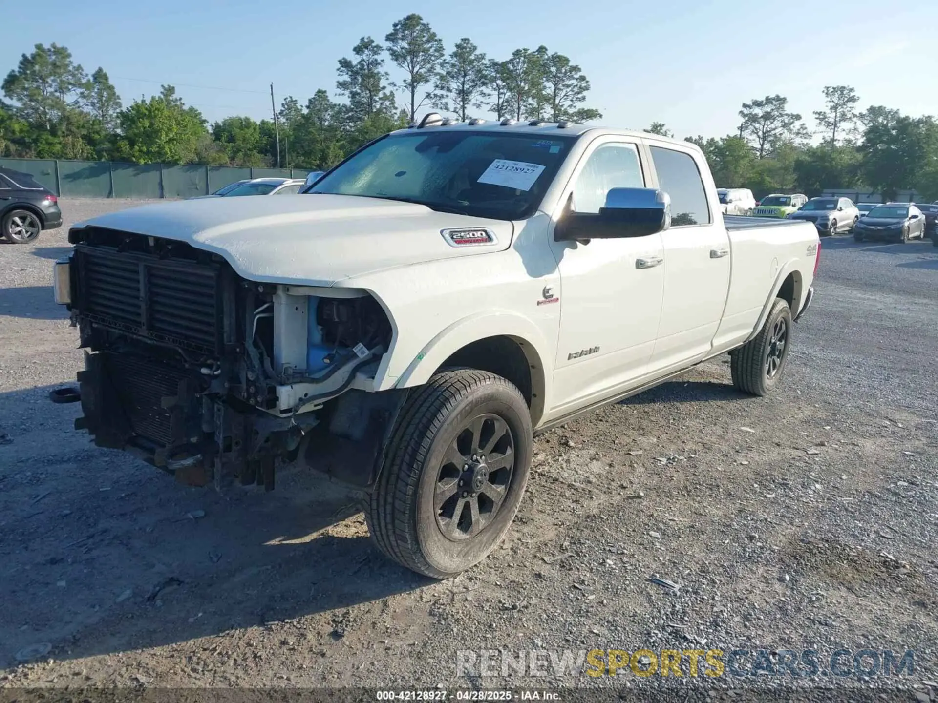 2 Photograph of a damaged car 3C6UR5KL0NG408021 RAM 2500 2022