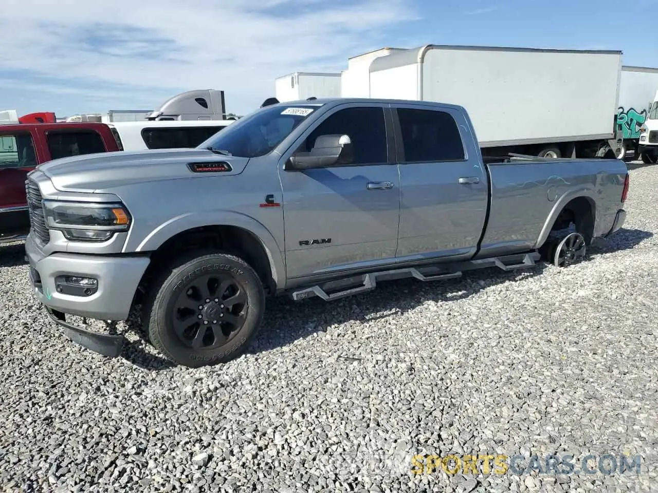 1 Photograph of a damaged car 3C6UR5KL5NG306956 RAM 2500 2022